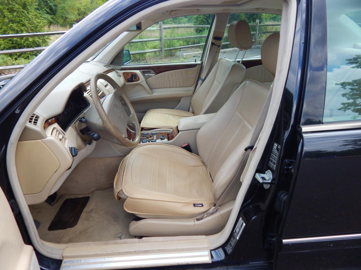 1999 Black /Tan Leather Mercedes-Benz E-Class E320 4-Matic (WDBJF82H2XX) with an 3.2L V6 SOHC 18V engine, 5-Speed Automatic Overdrive transmission, located at 6528 Lower York Road, New Hope, PA, 18938, (215) 862-9555, 40.358707, -74.977882 - Here we have a Mercedes E320 with a 3.2L V6 putting power to all four wheels via an automatic transmission. Options include: tan leather, wood trim, keyless entry, cruise control, tilt steering wheel, A/C, power windows/locks/mirrors, power moonroof, power and heated front seats, AM/FM/CD radio, dua - Photo#15