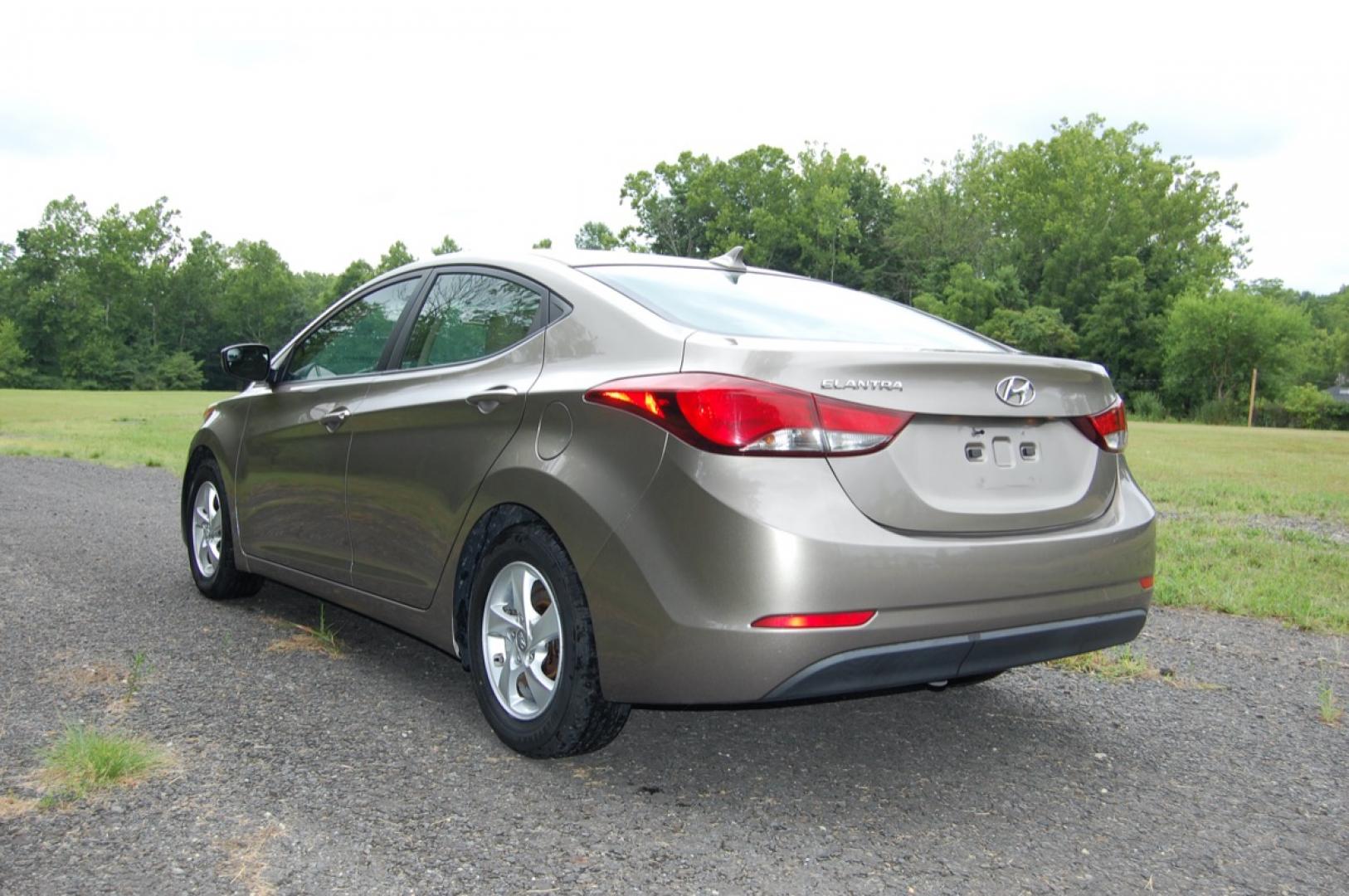 2014 Gold /Tan Cloth Hyundai Elantra (5NPDH4AE8EH) with an 1.8L L4 DOHC 16V engine, 6-Speed Manual transmission, located at 6528 Lower York Road, New Hope, PA, 18938, (215) 862-9555, 40.358707, -74.977882 - Here for sale is a very nice 2014 Hyundai Elantra sedan. Under the hood is a strong running 1.8 liter 4 cylinder which puts power to the front wheels via a smooth shifting 6 speed manual transmission with a solid clutch. Features include; Tan cloth interior, keyless entry system, one key, one rem - Photo#2