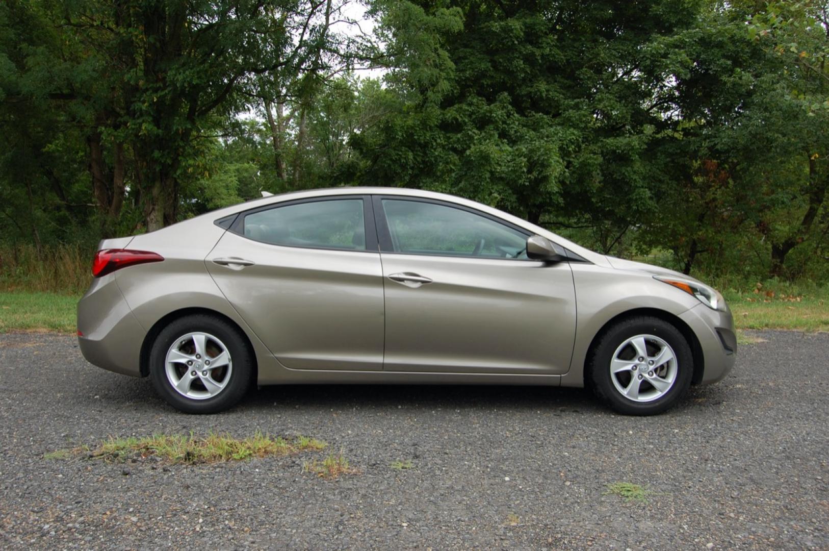 2014 Gold /Tan Cloth Hyundai Elantra (5NPDH4AE8EH) with an 1.8L L4 DOHC 16V engine, 6-Speed Manual transmission, located at 6528 Lower York Road, New Hope, PA, 18938, (215) 862-9555, 40.358707, -74.977882 - Here for sale is a very nice 2014 Hyundai Elantra sedan. Under the hood is a strong running 1.8 liter 4 cylinder which puts power to the front wheels via a smooth shifting 6 speed manual transmission with a solid clutch. Features include; Tan cloth interior, keyless entry system, one key, one rem - Photo#5