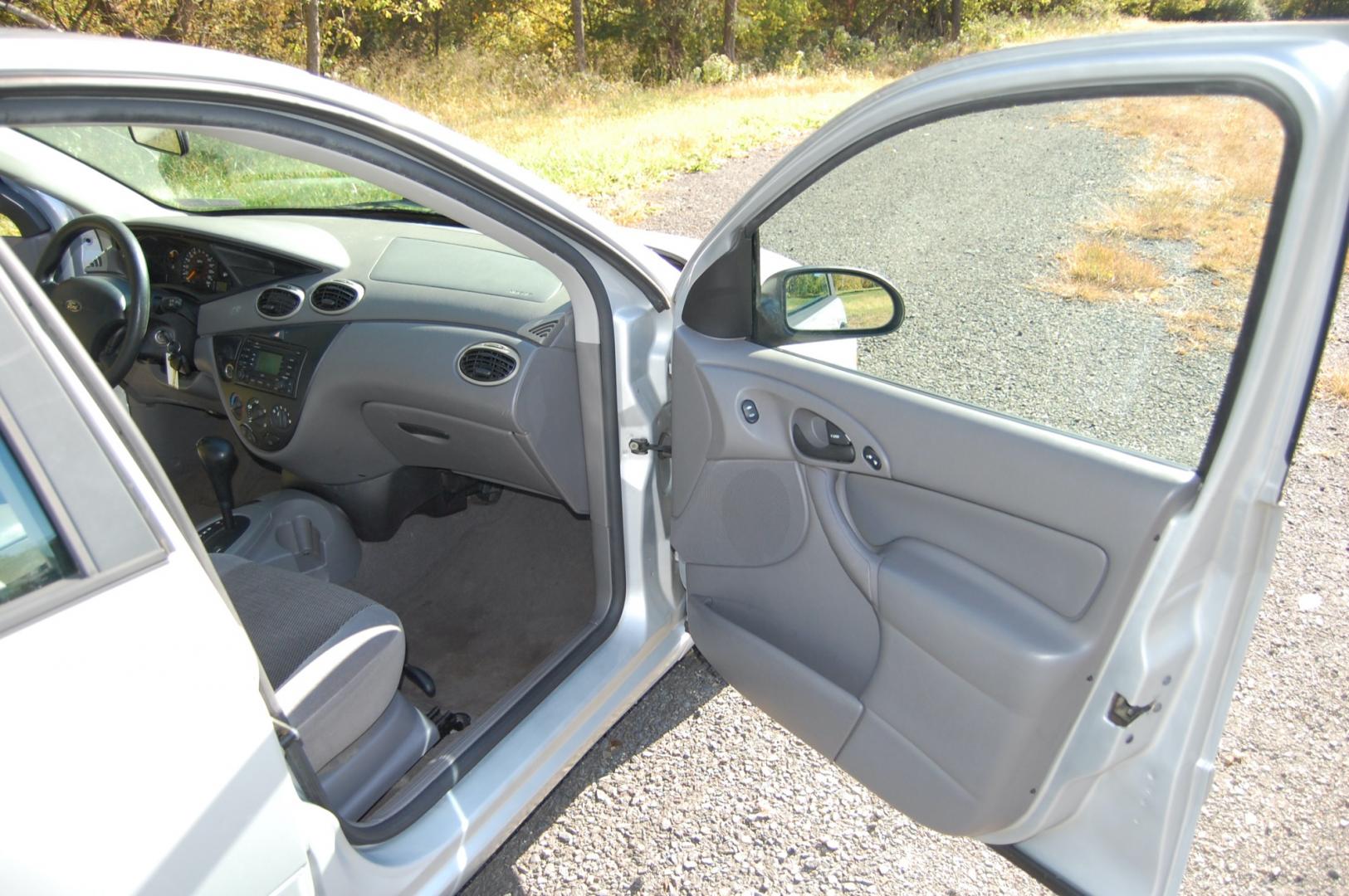 2003 Silver /Gray Cloth Ford Focus SE (1FAFP34P63W) with an 2.0L L4 SOHC 8V engine, Automatic transmission, located at 6528 Lower York Road, New Hope, PA, 18938, (215) 862-9555, 40.358707, -74.977882 - Here for sale is a very nice 2003 Ford Focus SE. Under the hood is a strong running 2.0 liter 4 cylinder which puts power to the front wheels via a smooth shifting automatic transmission. Features include; Gray cloth interior, keyless entry system, one remote, 2 keys, cruise control, tilt steerin - Photo#15