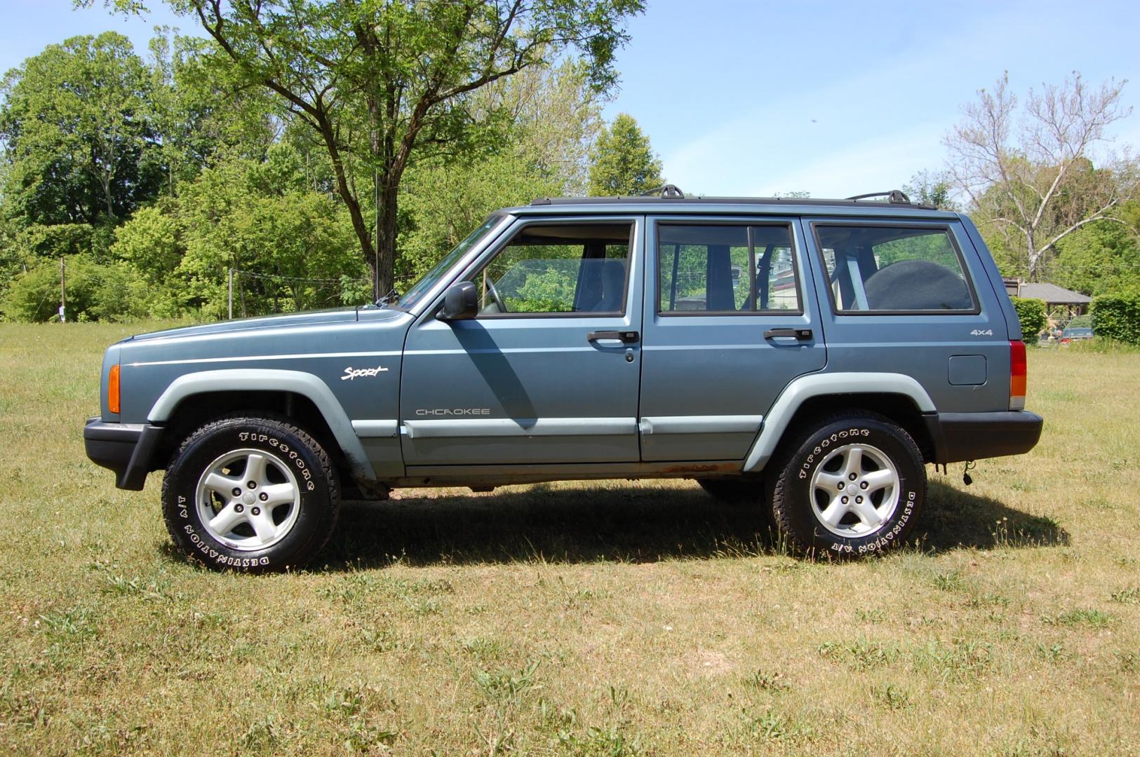 1998 Blue /Grey Jeep Cherokee Sport 4-Door 4WD (1J4FJ68S2WL) with an 4.0L L6 OHV 12V engine, Automatic transmission, located at 6528 Lower York Road, New Hope, PA, 18938, (215) 862-9555, 40.358707, -74.977882 - Here for sale is a 1998 Jeep Cherokee, has a 4.0 Liter straight six cylinder engine putting power to all 4 wheels via automatic transmission. The interior offers gray cloth, heat/AC, rear defrost, AM/FM/tape/CD sound system. Tilt wheel, power windows, locks and mirrors. Dual front air bags. Exteri - Photo#1