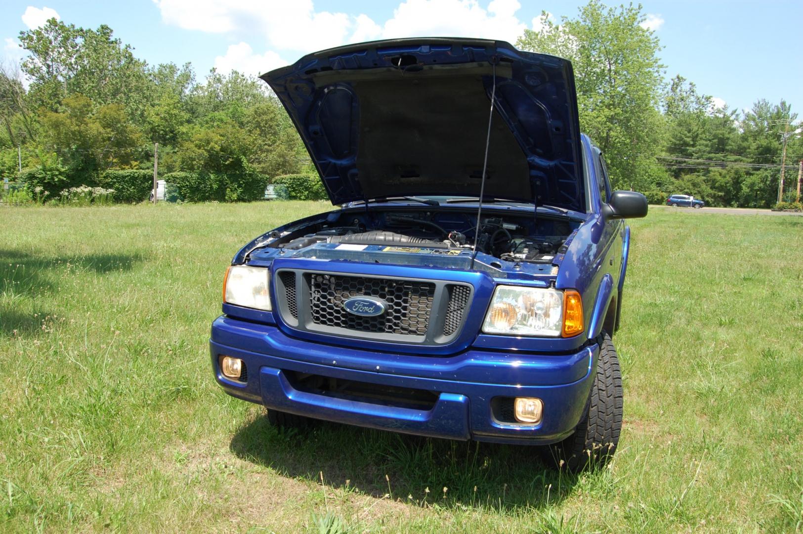 2005 Blue /Black/Gray cloth Ford Ranger Edge (1FTYR14U35P) with an 3.0L V6 OHV 12V engine, Automatic transmission, located at 6528 Lower York Road, New Hope, PA, 18938, (215) 862-9555, 40.358707, -74.977882 - Here for sale is a 2005 Ford Ranger superb Edge edition. Under the hood is a strong running 3.0 liter V6 which puts power to the rear wheels via it automatic transmission. Features include; Black/Gray cloth interior, cruise control, tilt steering wheel, cold AC, roll up windows, manual mirrors, ma - Photo#17