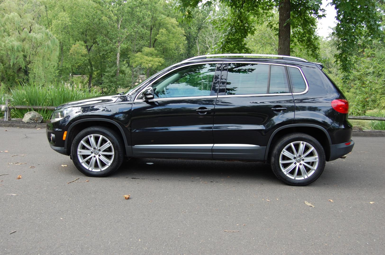 2012 Black /Black Leather Volkswagen Tiguan SE 4Motion (WVGBV7AX8CW) with an 2.0L L4 DOHC 16V TURBO engine, 6-Speed Automatic transmission, located at 6528 Lower York Road, New Hope, PA, 18938, (215) 862-9555, 40.358707, -74.977882 - Here is a very clean, 3 owner, 2012 Volkswagen Tiguan SE with AWD..powered by a 2.0 Liter 4 cylinder turbocharged engine, automatic transmission, keyless entry system, 2 Master keys, black leather interior, tilt wheel, cruise control, power windows, power locks, power mirrors, power moonroof, facto - Photo#0