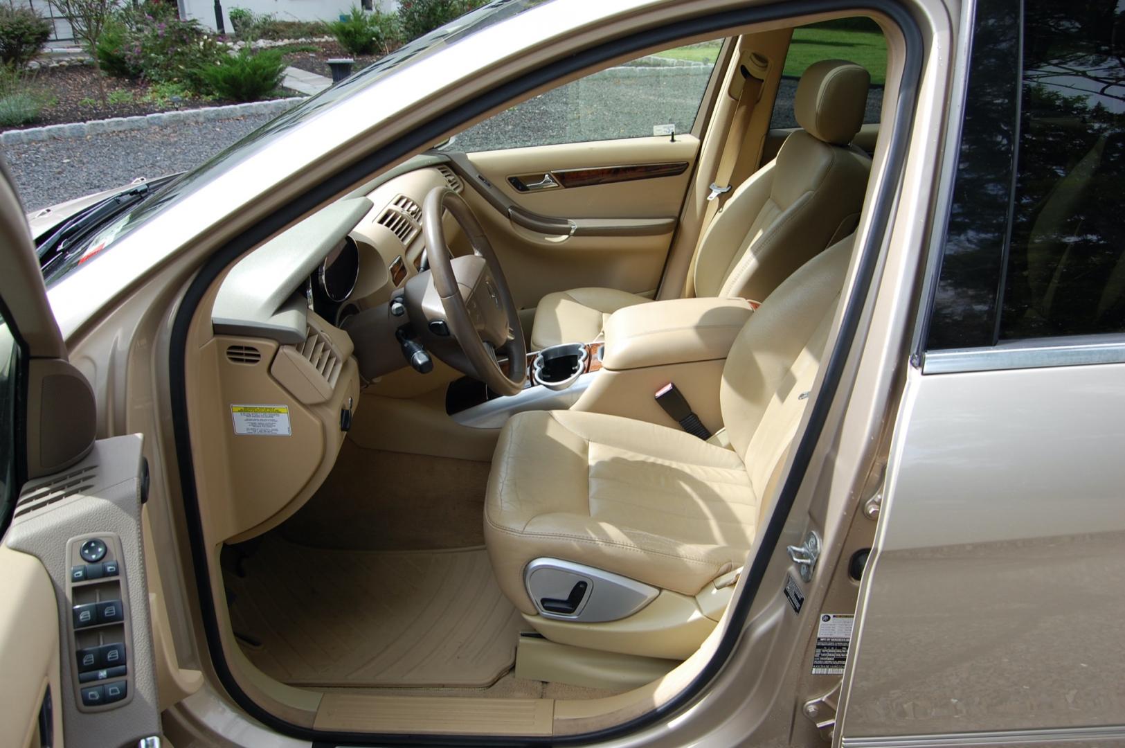 2006 Gold /Tan Leather Mercedes-Benz R-Class R350 (4JGCB65E16A) with an 3.5L V6 DOHC 24V engine, 7-Speed Automatic Overdrive transmission, located at 6528 Lower York Road, New Hope, PA, 18938, (215) 862-9555, 40.358707, -74.977882 - Here we have a 2006 R350 with a 3.5L V6 putting power to all four wheels via an automatic transmission. The interior offers tan leather with wood trim, dual/ rear climate controls, heated front seats, AM/FM/AUX radio with navigation, Harman/Kardon speakers, tilt steering wheel, auto headlights, crui - Photo#9