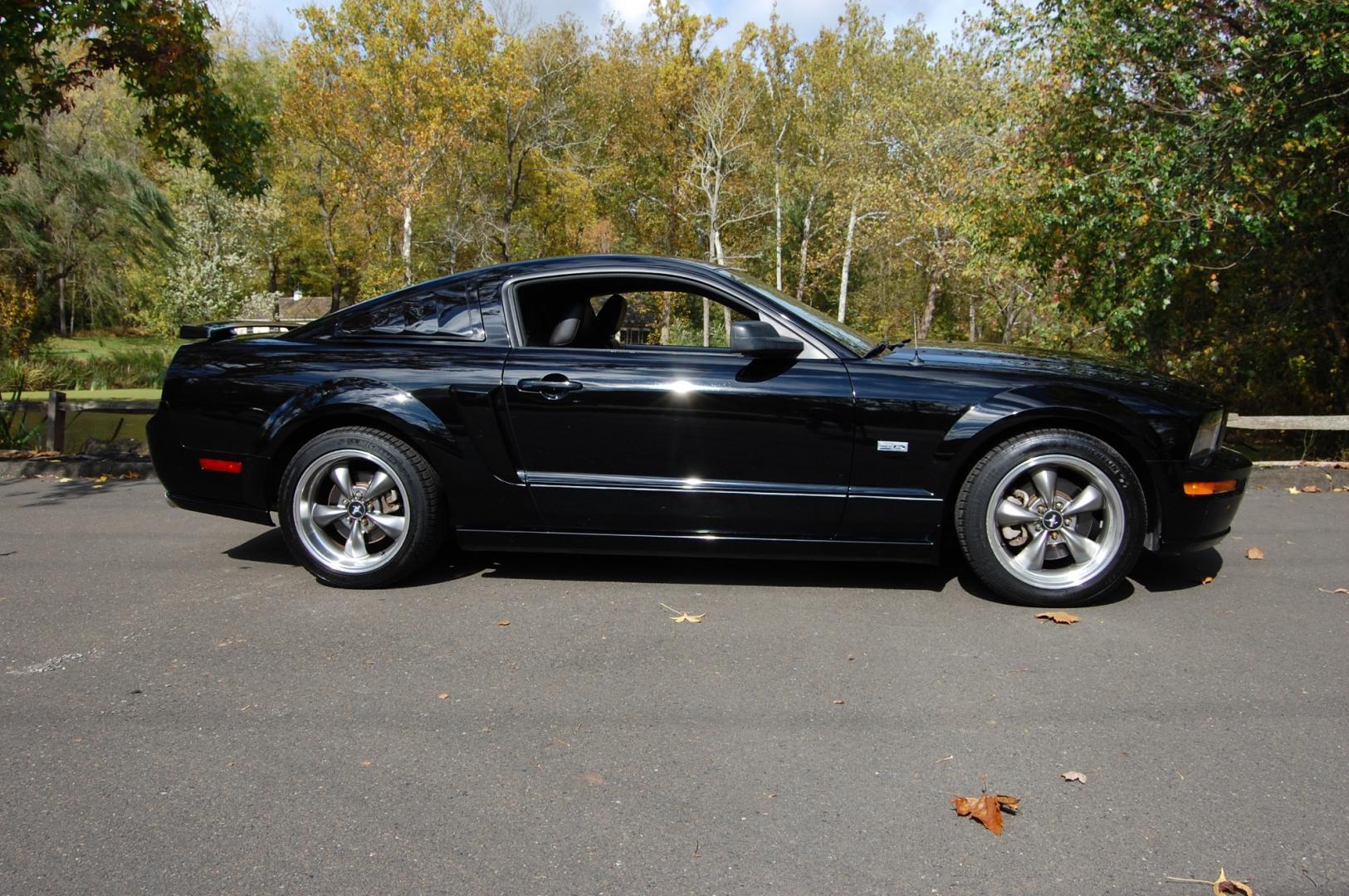 2005 Black /Black leather Ford Mustang GT Premium Coupe (1ZVHT82H455) with an 4.6L V8 SOHC 24V engine, 5 Speed Manual transmission, located at 6528 Lower York Road, New Hope, PA, 18938, (215) 862-9555, 40.358707, -74.977882 - Here we have a beautiful Ford Mustang GT, only 25k original miles, a 4.6L V8 putting power to the rear wheels via a manual 5 speed transmission. The interior offers black leather, keyless entry, heat, A/C, AM/FM/CD/AUX radio, tilt steering wheel, cruise control, power windows, power locks and pow - Photo#0