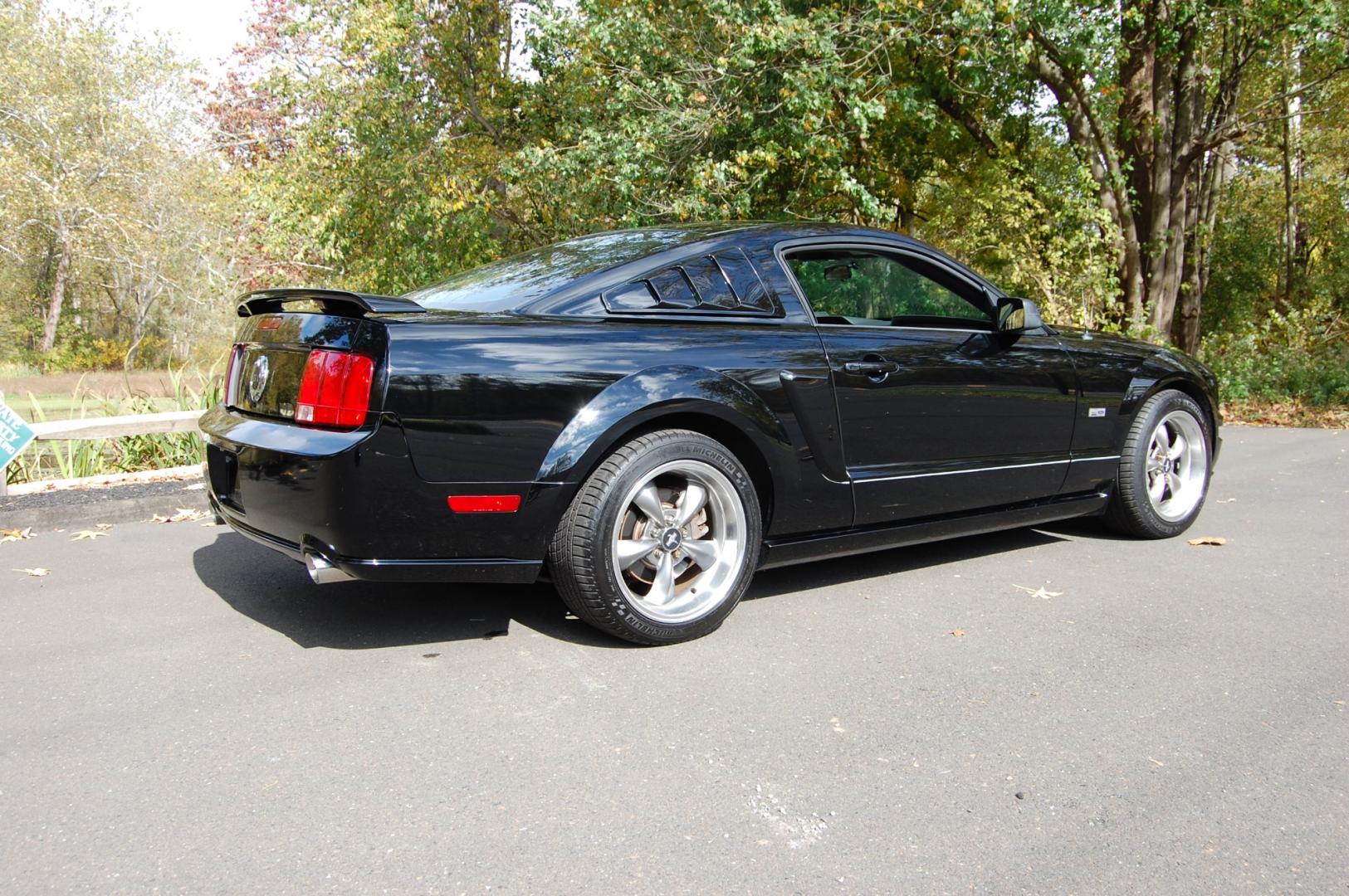 2005 Black /Black leather Ford Mustang GT Premium Coupe (1ZVHT82H455) with an 4.6L V8 SOHC 24V engine, 5 Speed Manual transmission, located at 6528 Lower York Road, New Hope, PA, 18938, (215) 862-9555, 40.358707, -74.977882 - Here we have a beautiful Ford Mustang GT, only 25k original miles, a 4.6L V8 putting power to the rear wheels via a manual 5 speed transmission. The interior offers black leather, keyless entry, heat, A/C, AM/FM/CD/AUX radio, tilt steering wheel, cruise control, power windows, power locks and pow - Photo#9