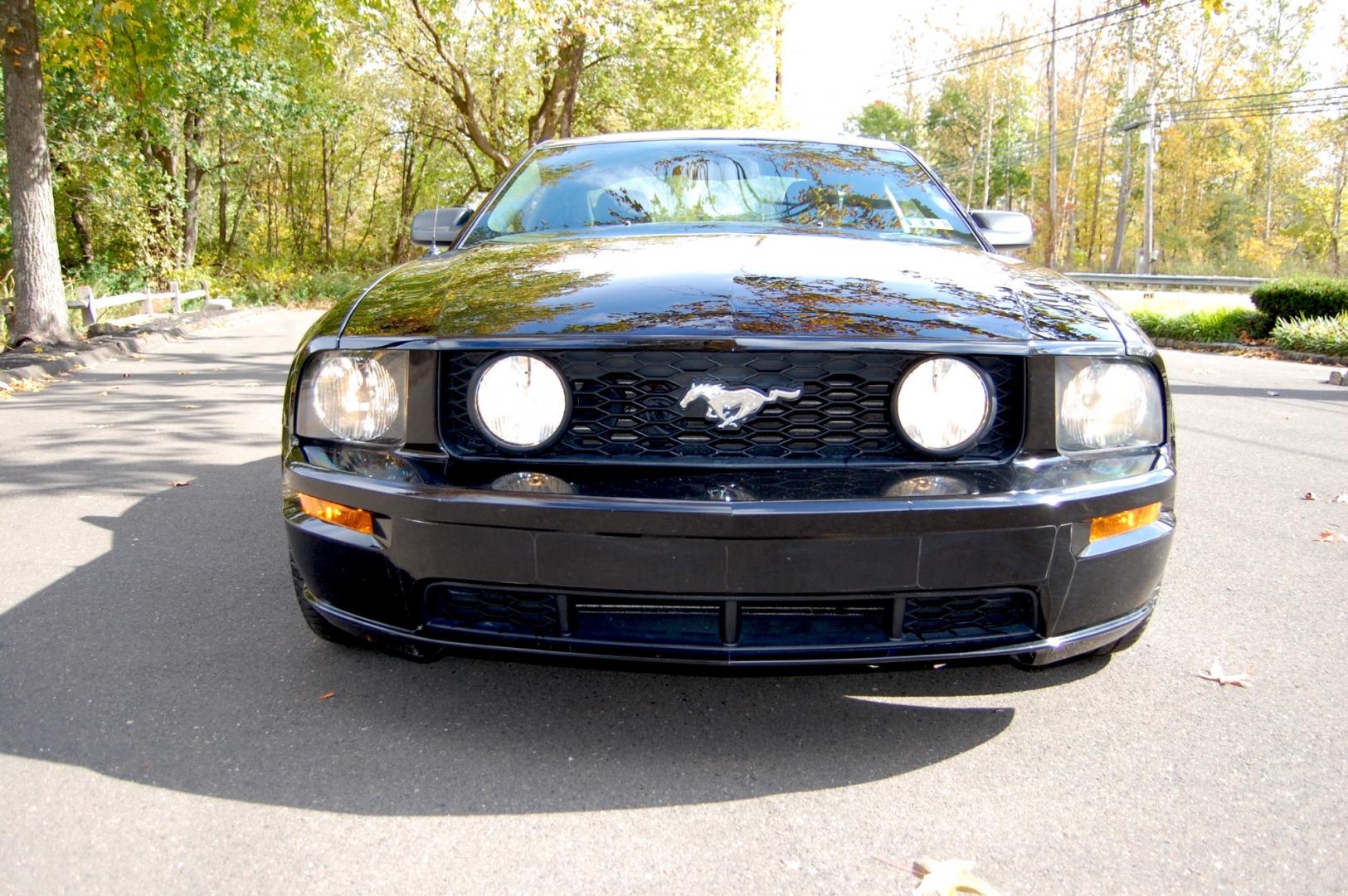 2005 Black /Black leather Ford Mustang GT Premium Coupe (1ZVHT82H455) with an 4.6L V8 SOHC 24V engine, 5 Speed Manual transmission, located at 6528 Lower York Road, New Hope, PA, 18938, (215) 862-9555, 40.358707, -74.977882 - Here we have a beautiful Ford Mustang GT, only 25k original miles, a 4.6L V8 putting power to the rear wheels via a manual 5 speed transmission. The interior offers black leather, keyless entry, heat, A/C, AM/FM/CD/AUX radio, tilt steering wheel, cruise control, power windows, power locks and pow - Photo#11