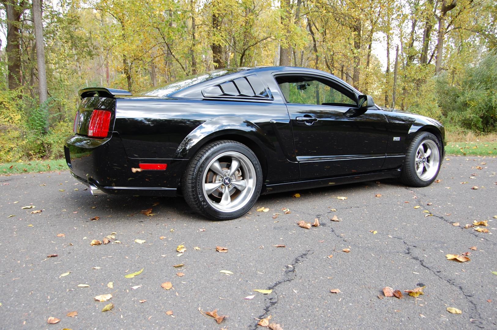 2005 Black /Black leather Ford Mustang GT Premium Coupe (1ZVHT82H455) with an 4.6L V8 SOHC 24V engine, 5 Speed Manual transmission, located at 6528 Lower York Road, New Hope, PA, 18938, (215) 862-9555, 40.358707, -74.977882 - Here we have a beautiful Ford Mustang GT, only 25k original miles, a 4.6L V8 putting power to the rear wheels via a manual 5 speed transmission. The interior offers black leather, keyless entry, heat, A/C, AM/FM/CD/AUX radio, tilt steering wheel, cruise control, power windows, power locks and pow - Photo#12