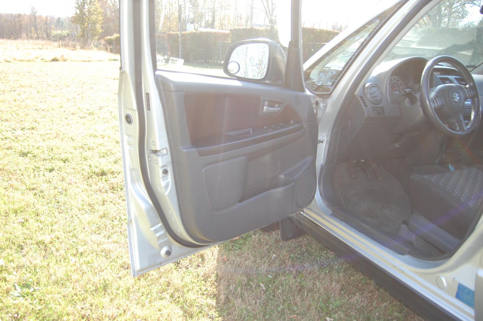 2009 Silver /Back Cloth Suzuki SX4 Crossover Crossover (JS2YB417095) with an 2.0L L4 DOHC 16V engine, 5 Speed Manual transmission, located at 6528 Lower York Road, New Hope, PA, 18938, (215) 862-9555, 40.358707, -74.977882 - Here for sale is a very nice 2009 Suzuki SX4 Crossover. Under the hood is a strong running 2.0 liter 4 cylinder which puts power to 2 or 4 wheels via a solid shifting 5 speed manual transmission with a strong clutch. Features include; Black cloth interior, keyless entry system, 2 master keys, one - Photo#13