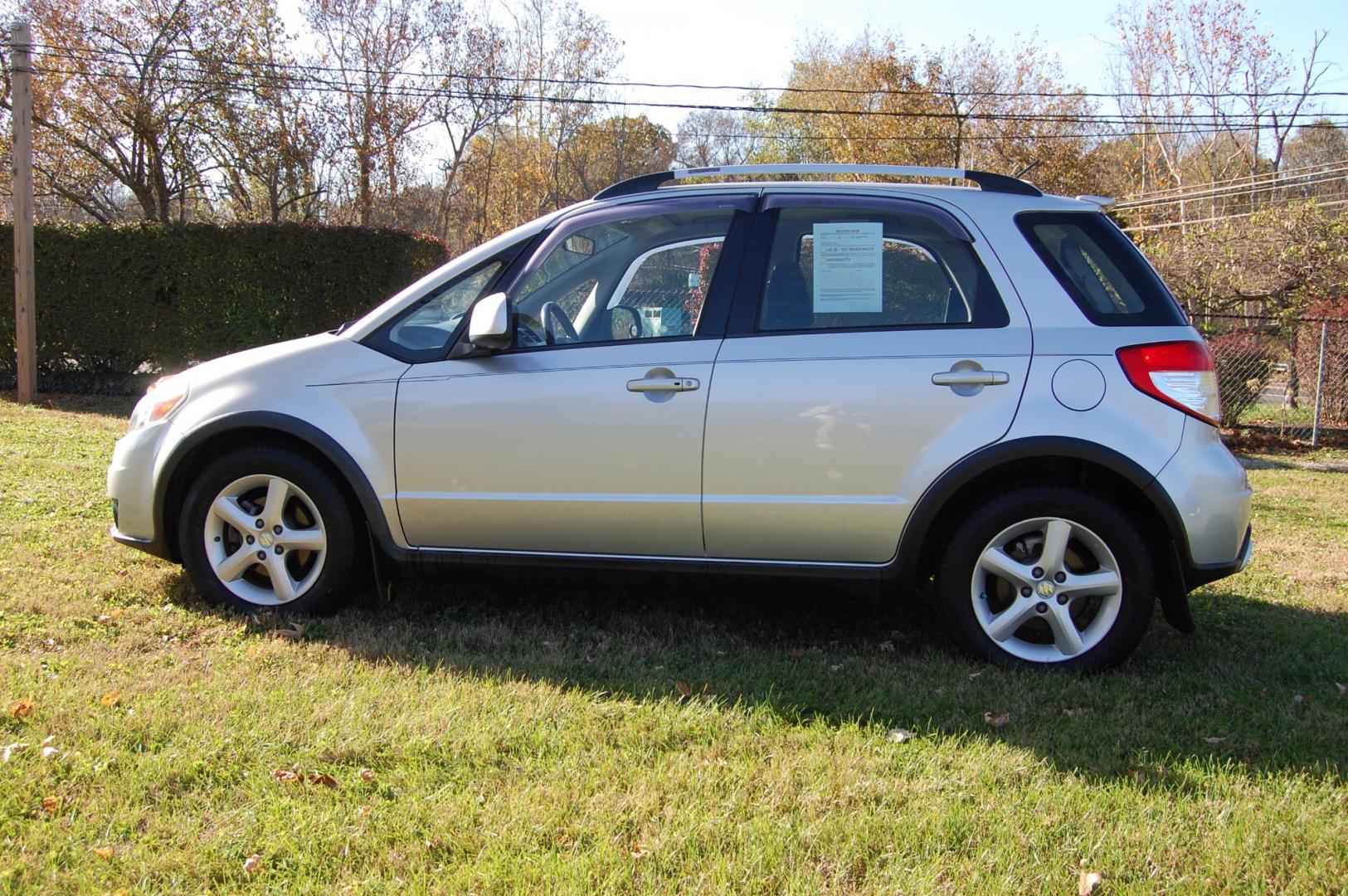 2009 Silver /Back Cloth Suzuki SX4 Crossover Crossover (JS2YB417095) with an 2.0L L4 DOHC 16V engine, 5 Speed Manual transmission, located at 6528 Lower York Road, New Hope, PA, 18938, (215) 862-9555, 40.358707, -74.977882 - Here for sale is a very nice 2009 Suzuki SX4 Crossover. Under the hood is a strong running 2.0 liter 4 cylinder which puts power to 2 or 4 wheels via a solid shifting 5 speed manual transmission with a strong clutch. Features include; Black cloth interior, keyless entry system, 2 master keys, one - Photo#1