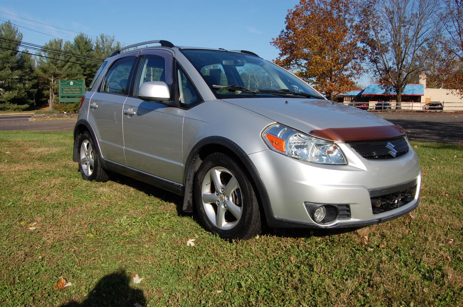 2009 Silver /Back Cloth Suzuki SX4 Crossover Crossover (JS2YB417095) with an 2.0L L4 DOHC 16V engine, 5 Speed Manual transmission, located at 6528 Lower York Road, New Hope, PA, 18938, (215) 862-9555, 40.358707, -74.977882 - Here for sale is a very nice 2009 Suzuki SX4 Crossover. Under the hood is a strong running 2.0 liter 4 cylinder which puts power to 2 or 4 wheels via a solid shifting 5 speed manual transmission with a strong clutch. Features include; Black cloth interior, keyless entry system, 2 master keys, one - Photo#2