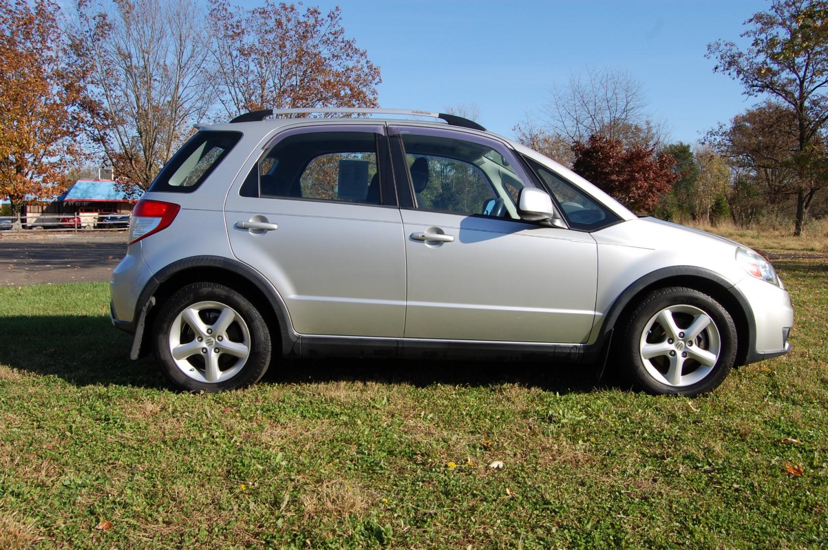 2009 Silver /Back Cloth Suzuki SX4 Crossover Crossover (JS2YB417095) with an 2.0L L4 DOHC 16V engine, 5 Speed Manual transmission, located at 6528 Lower York Road, New Hope, PA, 18938, (215) 862-9555, 40.358707, -74.977882 - Here for sale is a very nice 2009 Suzuki SX4 Crossover. Under the hood is a strong running 2.0 liter 4 cylinder which puts power to 2 or 4 wheels via a solid shifting 5 speed manual transmission with a strong clutch. Features include; Black cloth interior, keyless entry system, 2 master keys, one - Photo#3