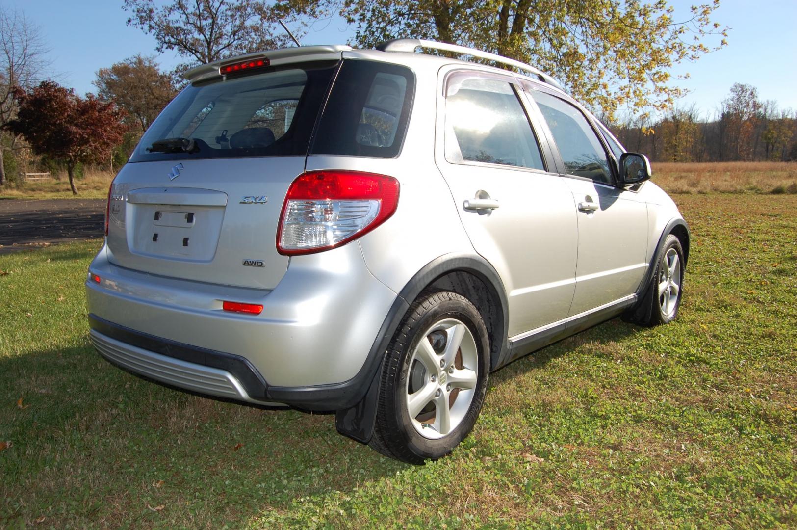 2009 Silver /Back Cloth Suzuki SX4 Crossover Crossover (JS2YB417095) with an 2.0L L4 DOHC 16V engine, 5 Speed Manual transmission, located at 6528 Lower York Road, New Hope, PA, 18938, (215) 862-9555, 40.358707, -74.977882 - Here for sale is a very nice 2009 Suzuki SX4 Crossover. Under the hood is a strong running 2.0 liter 4 cylinder which puts power to 2 or 4 wheels via a solid shifting 5 speed manual transmission with a strong clutch. Features include; Black cloth interior, keyless entry system, 2 master keys, one - Photo#4