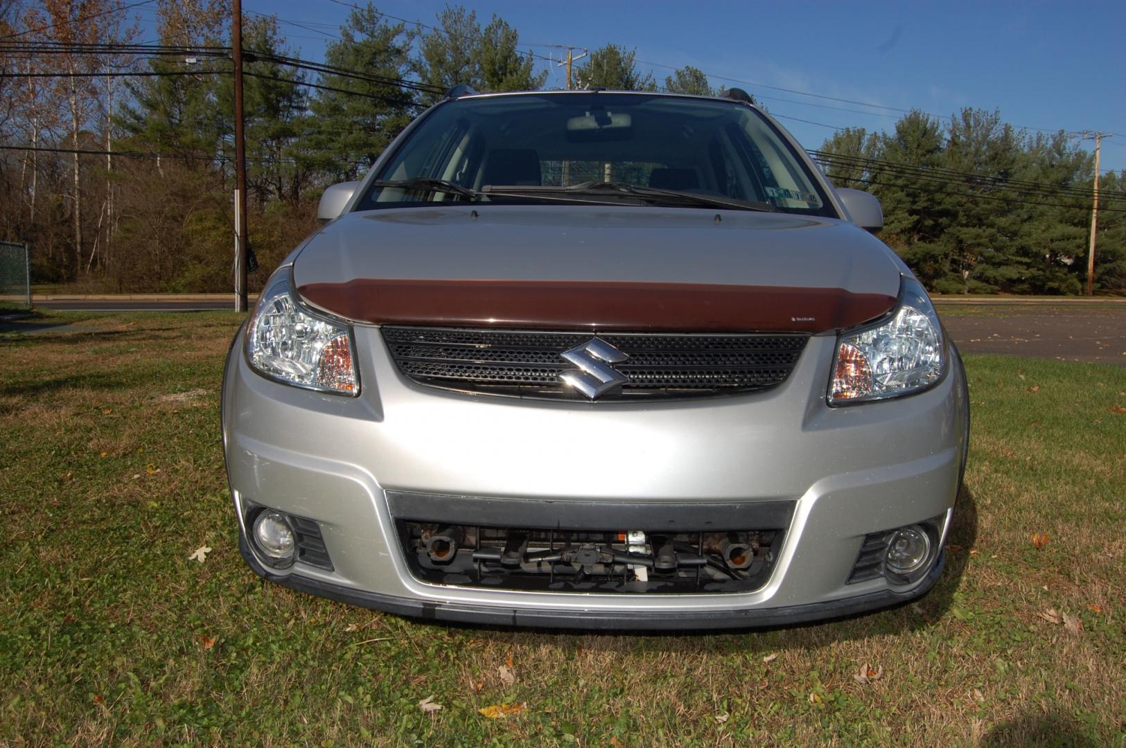 2009 Silver /Back Cloth Suzuki SX4 Crossover Crossover (JS2YB417095) with an 2.0L L4 DOHC 16V engine, 5 Speed Manual transmission, located at 6528 Lower York Road, New Hope, PA, 18938, (215) 862-9555, 40.358707, -74.977882 - Here for sale is a very nice 2009 Suzuki SX4 Crossover. Under the hood is a strong running 2.0 liter 4 cylinder which puts power to 2 or 4 wheels via a solid shifting 5 speed manual transmission with a strong clutch. Features include; Black cloth interior, keyless entry system, 2 master keys, one - Photo#6