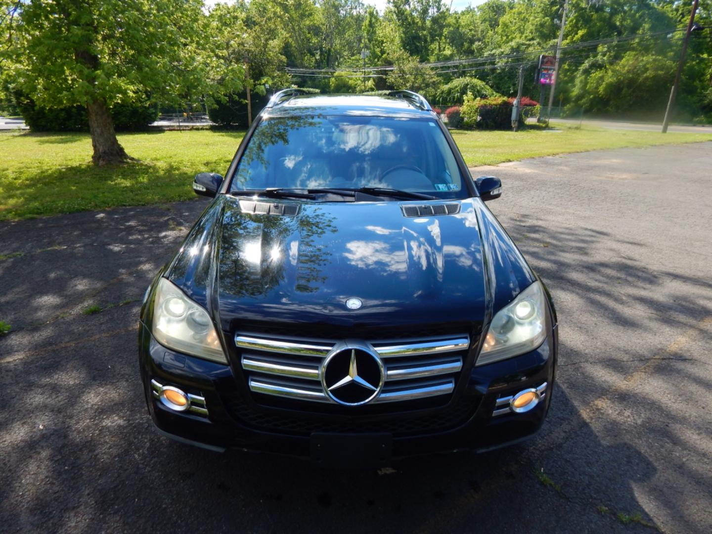 2008 Black /Tan leather Mercedes-Benz GL-Class GL550 (4JGBF86E28A) with an 5.5L V8 DOHC 32V engine, 7-Speed Automatic Overdrive transmission, located at 6528 Lower York Road, New Hope, PA, 18938, (215) 862-9555, 40.358707, -74.977882 - Here we have a beautiful Mercedes GL 550 with a 5.5L V8 putting power to all 4 wheel via a smooth shifting automatic transmission. Options include: tan leather, wood trim, keyless entry, dual power front seats, dual plus rear climate controls, heated seats, AM/FM/SAT/6CD/AUX radio, aftermarket rear - Photo#8