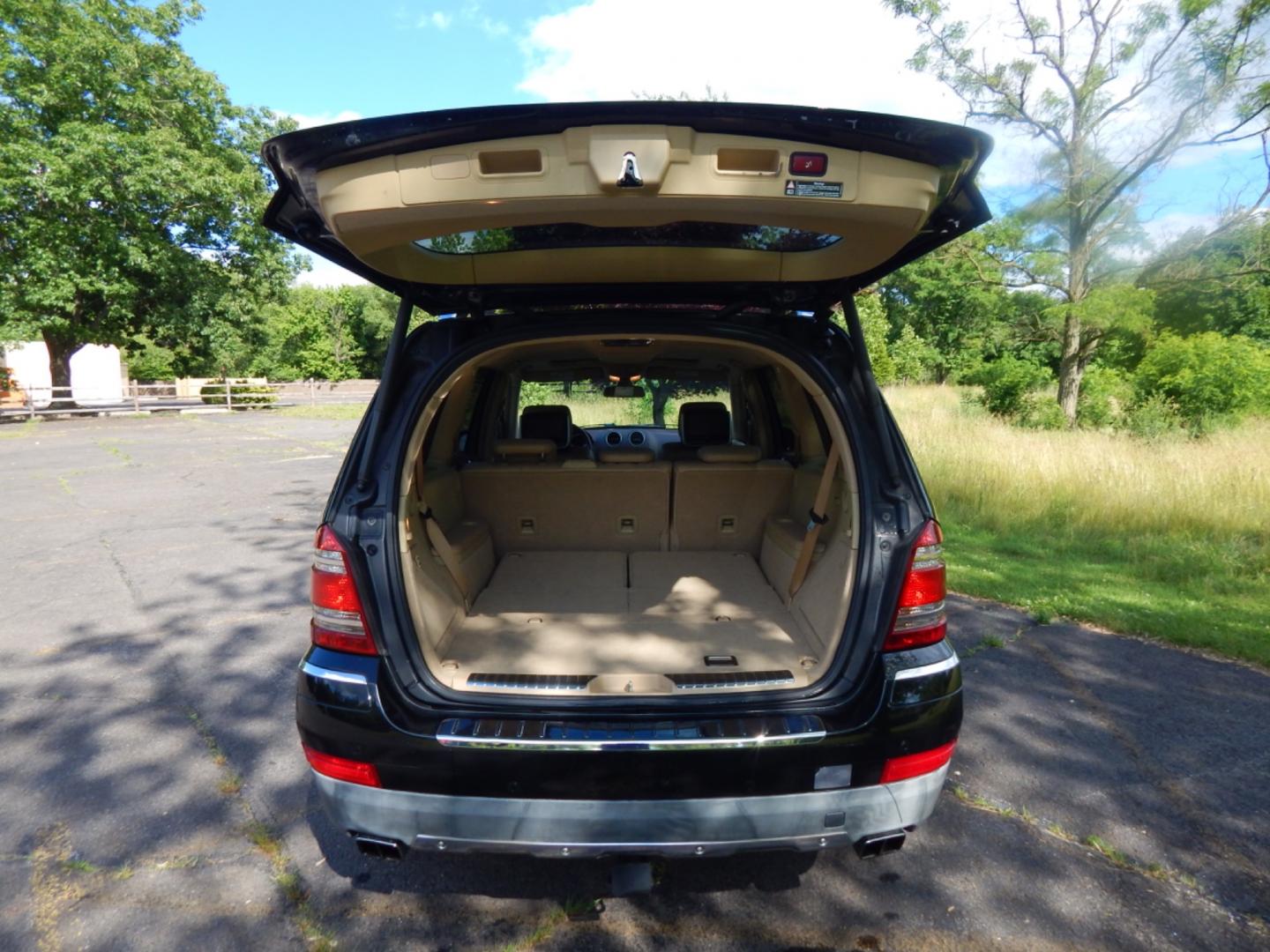 2008 Black /Tan leather Mercedes-Benz GL-Class GL550 (4JGBF86E28A) with an 5.5L V8 DOHC 32V engine, 7-Speed Automatic Overdrive transmission, located at 6528 Lower York Road, New Hope, PA, 18938, (215) 862-9555, 40.358707, -74.977882 - Here we have a beautiful Mercedes GL 550 with a 5.5L V8 putting power to all 4 wheel via a smooth shifting automatic transmission. Options include: tan leather, wood trim, keyless entry, dual power front seats, dual plus rear climate controls, heated seats, AM/FM/SAT/6CD/AUX radio, aftermarket rear - Photo#13