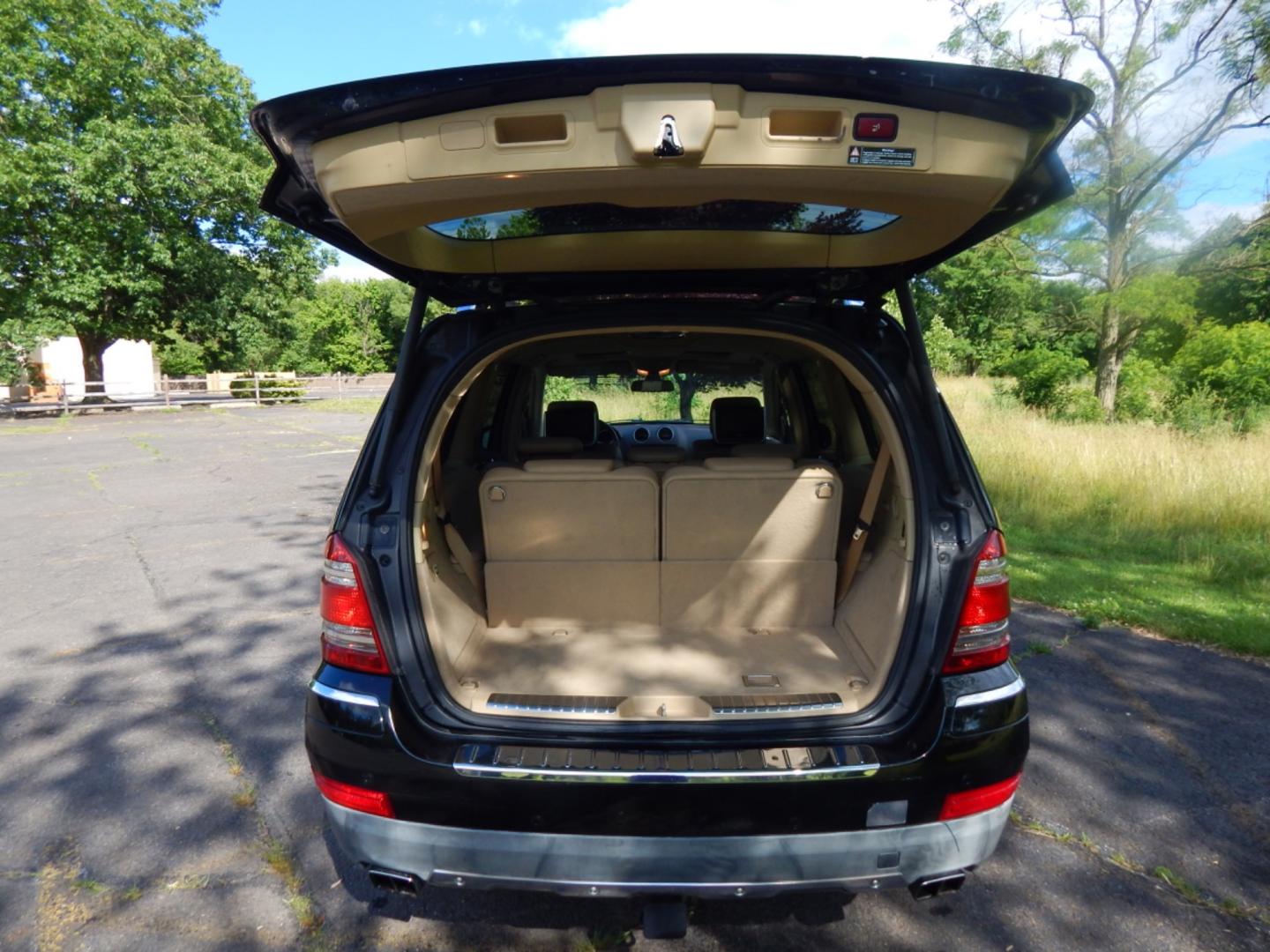 2008 Black /Tan leather Mercedes-Benz GL-Class GL550 (4JGBF86E28A) with an 5.5L V8 DOHC 32V engine, 7-Speed Automatic Overdrive transmission, located at 6528 Lower York Road, New Hope, PA, 18938, (215) 862-9555, 40.358707, -74.977882 - Here we have a beautiful Mercedes GL 550 with a 5.5L V8 putting power to all 4 wheel via a smooth shifting automatic transmission. Options include: tan leather, wood trim, keyless entry, dual power front seats, dual plus rear climate controls, heated seats, AM/FM/SAT/6CD/AUX radio, aftermarket rear - Photo#15