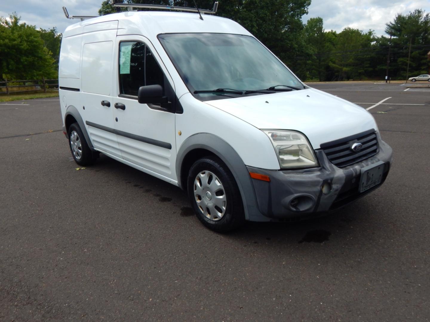 2012 White /Gray Cloth Ford Transit Connect XL (NM0LS7CN4CT) with an 2.0L 4 cylinder engine, Automatic transmission, located at 6528 Lower York Road, New Hope, PA, 18938, (215) 862-9555, 40.358707, -74.977882 - Here we have a Ford Transit Connect with a 2.0L 4 cylinder engine putting power to the front wheels via an automatic transmission. Options include: gray cloth, cargo shelves, dividing wall, AC/heat, AM/FM radio, roll up windows, 2 sliding doors, 50/50 split rear opening doors, tilt steering wheel, r - Photo#4