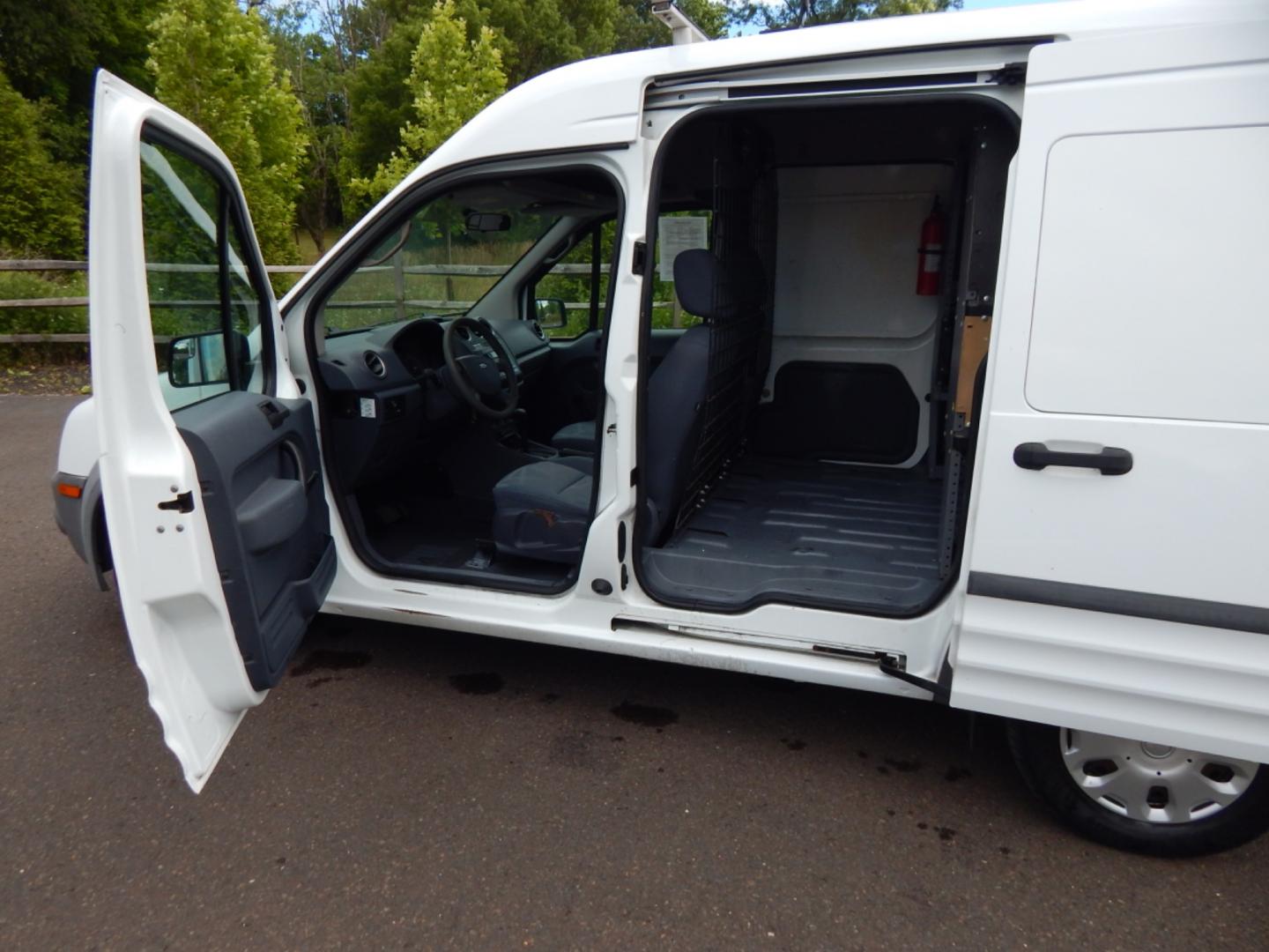 2012 White /Gray Cloth Ford Transit Connect XL (NM0LS7CN4CT) with an 2.0L 4 cylinder engine, Automatic transmission, located at 6528 Lower York Road, New Hope, PA, 18938, (215) 862-9555, 40.358707, -74.977882 - Here we have a Ford Transit Connect with a 2.0L 4 cylinder engine putting power to the front wheels via an automatic transmission. Options include: gray cloth, cargo shelves, dividing wall, AC/heat, AM/FM radio, roll up windows, 2 sliding doors, 50/50 split rear opening doors, tilt steering wheel, r - Photo#7