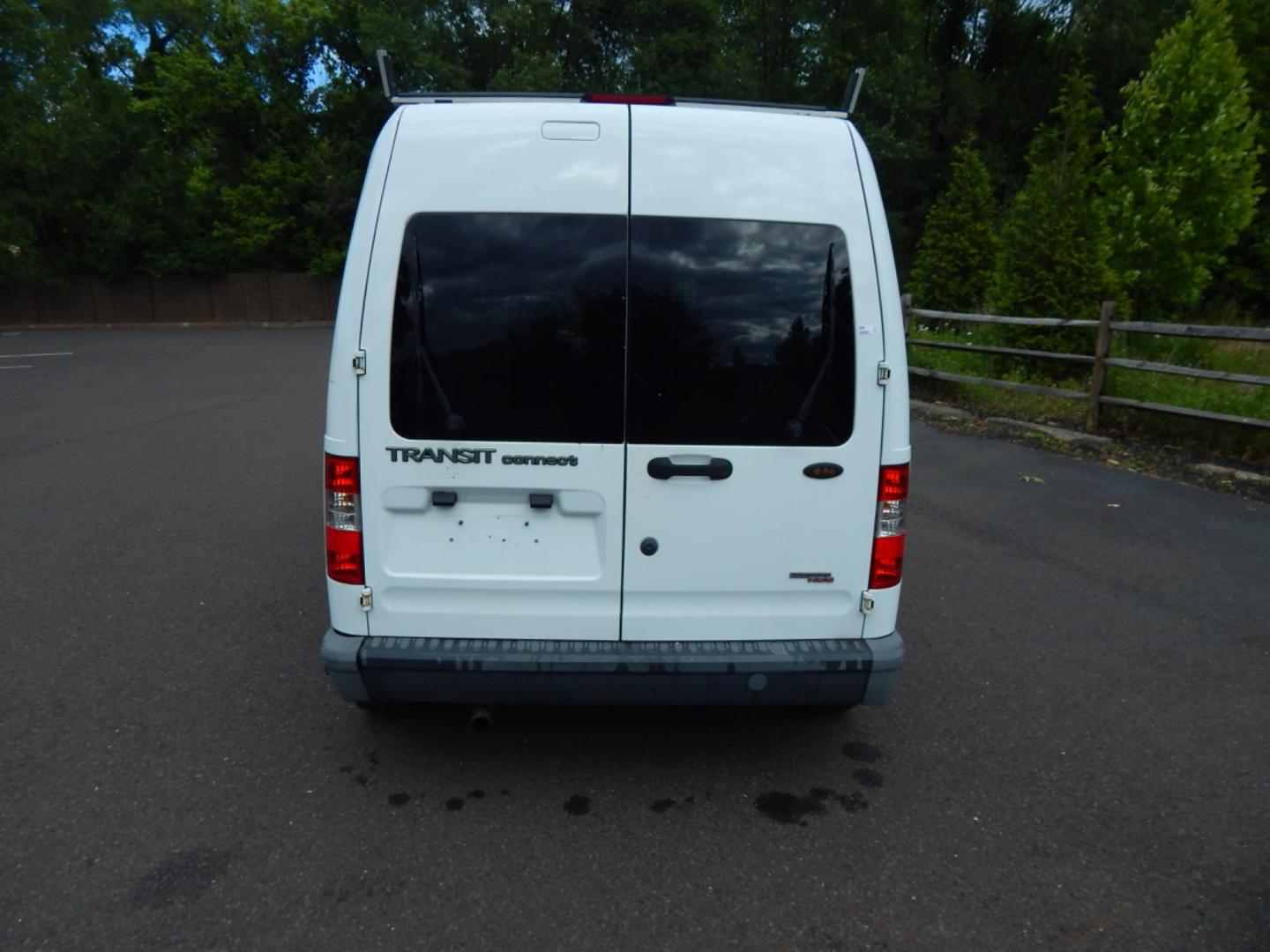 2012 White /Gray Cloth Ford Transit Connect XL (NM0LS7CN4CT) with an 2.0L 4 cylinder engine, Automatic transmission, located at 6528 Lower York Road, New Hope, PA, 18938, (215) 862-9555, 40.358707, -74.977882 - Here we have a Ford Transit Connect with a 2.0L 4 cylinder engine putting power to the front wheels via an automatic transmission. Options include: gray cloth, cargo shelves, dividing wall, AC/heat, AM/FM radio, roll up windows, 2 sliding doors, 50/50 split rear opening doors, tilt steering wheel, r - Photo#9