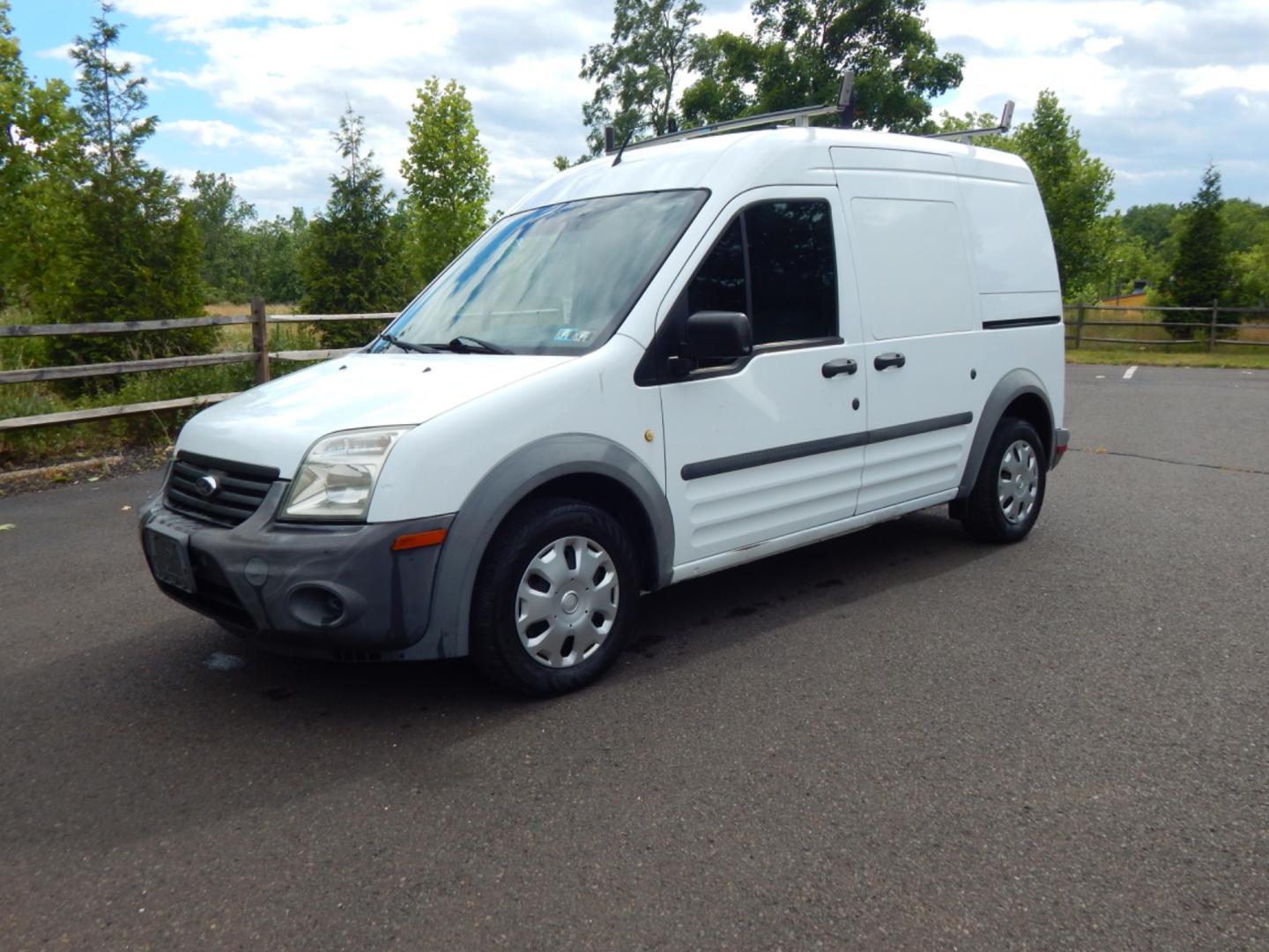 2012 White /Gray Cloth Ford Transit Connect XL (NM0LS7CN4CT) with an 2.0L 4 cylinder engine, Automatic transmission, located at 6528 Lower York Road, New Hope, PA, 18938, (215) 862-9555, 40.358707, -74.977882 - Here we have a Ford Transit Connect with a 2.0L 4 cylinder engine putting power to the front wheels via an automatic transmission. Options include: gray cloth, cargo shelves, dividing wall, AC/heat, AM/FM radio, roll up windows, 2 sliding doors, 50/50 split rear opening doors, tilt steering wheel, r - Photo#0