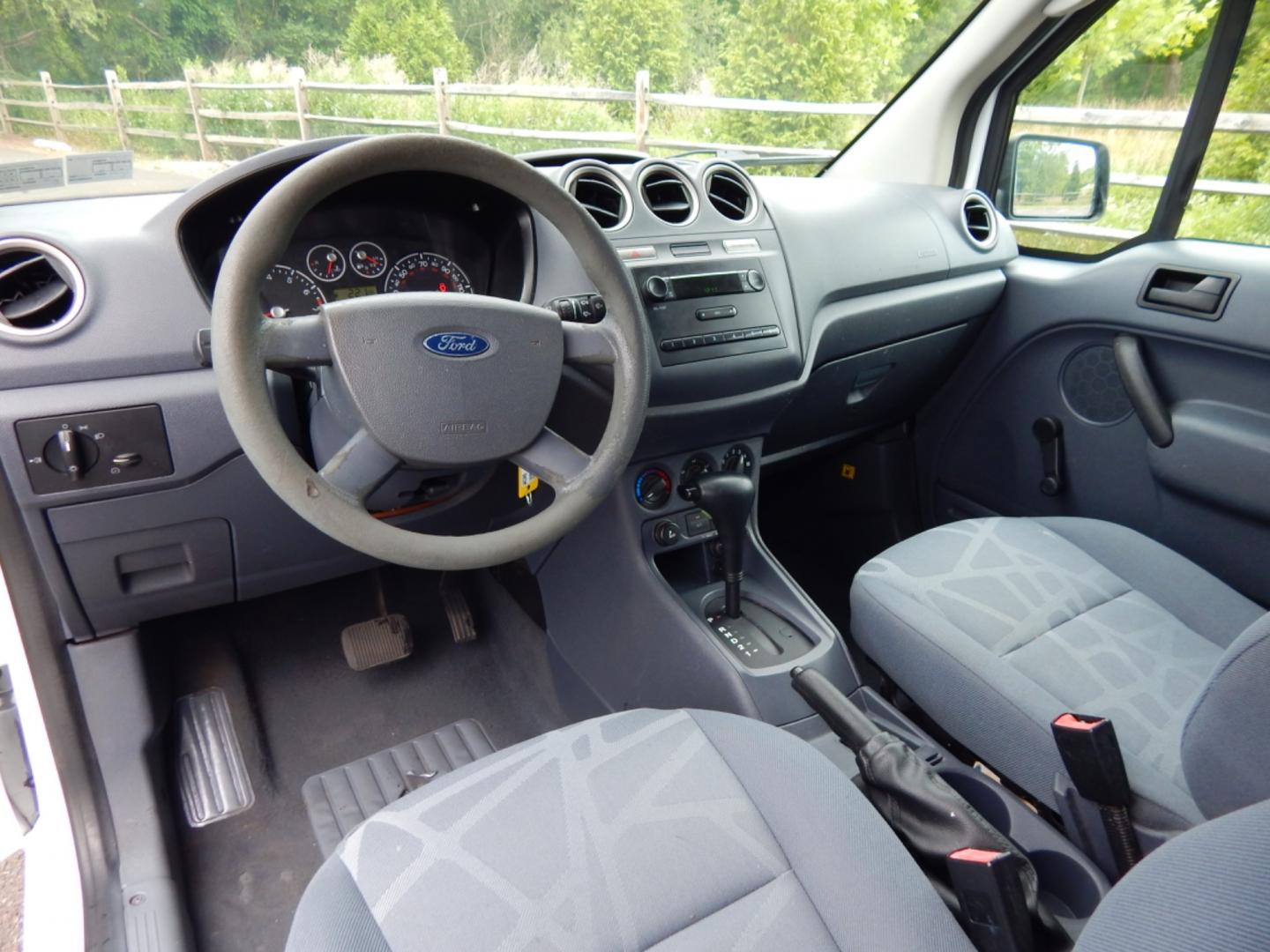 2012 White /Gray Cloth Ford Transit Connect XL (NM0LS7CN4CT) with an 2.0L 4 cylinder engine, Automatic transmission, located at 6528 Lower York Road, New Hope, PA, 18938, (215) 862-9555, 40.358707, -74.977882 - Here we have a Ford Transit Connect with a 2.0L 4 cylinder engine putting power to the front wheels via an automatic transmission. Options include: gray cloth, cargo shelves, dividing wall, AC/heat, AM/FM radio, roll up windows, 2 sliding doors, 50/50 split rear opening doors, tilt steering wheel, r - Photo#10