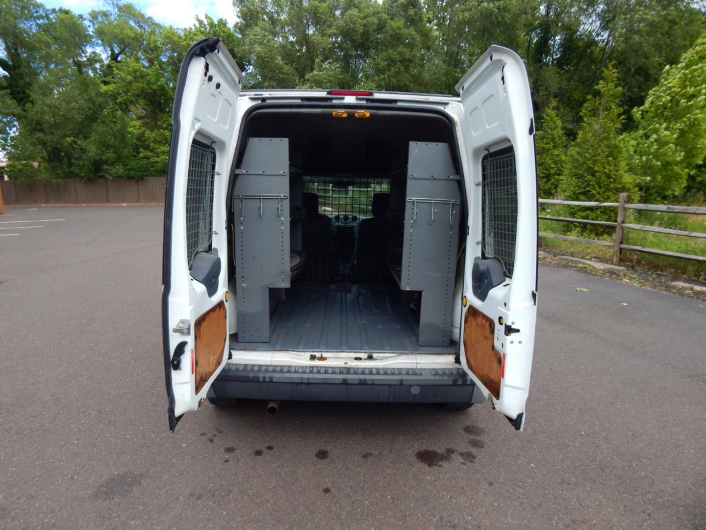 2012 White /Gray Cloth Ford Transit Connect XL (NM0LS7CN4CT) with an 2.0L 4 cylinder engine, Automatic transmission, located at 6528 Lower York Road, New Hope, PA, 18938, (215) 862-9555, 40.358707, -74.977882 - Here we have a Ford Transit Connect with a 2.0L 4 cylinder engine putting power to the front wheels via an automatic transmission. Options include: gray cloth, cargo shelves, dividing wall, AC/heat, AM/FM radio, roll up windows, 2 sliding doors, 50/50 split rear opening doors, tilt steering wheel, r - Photo#18