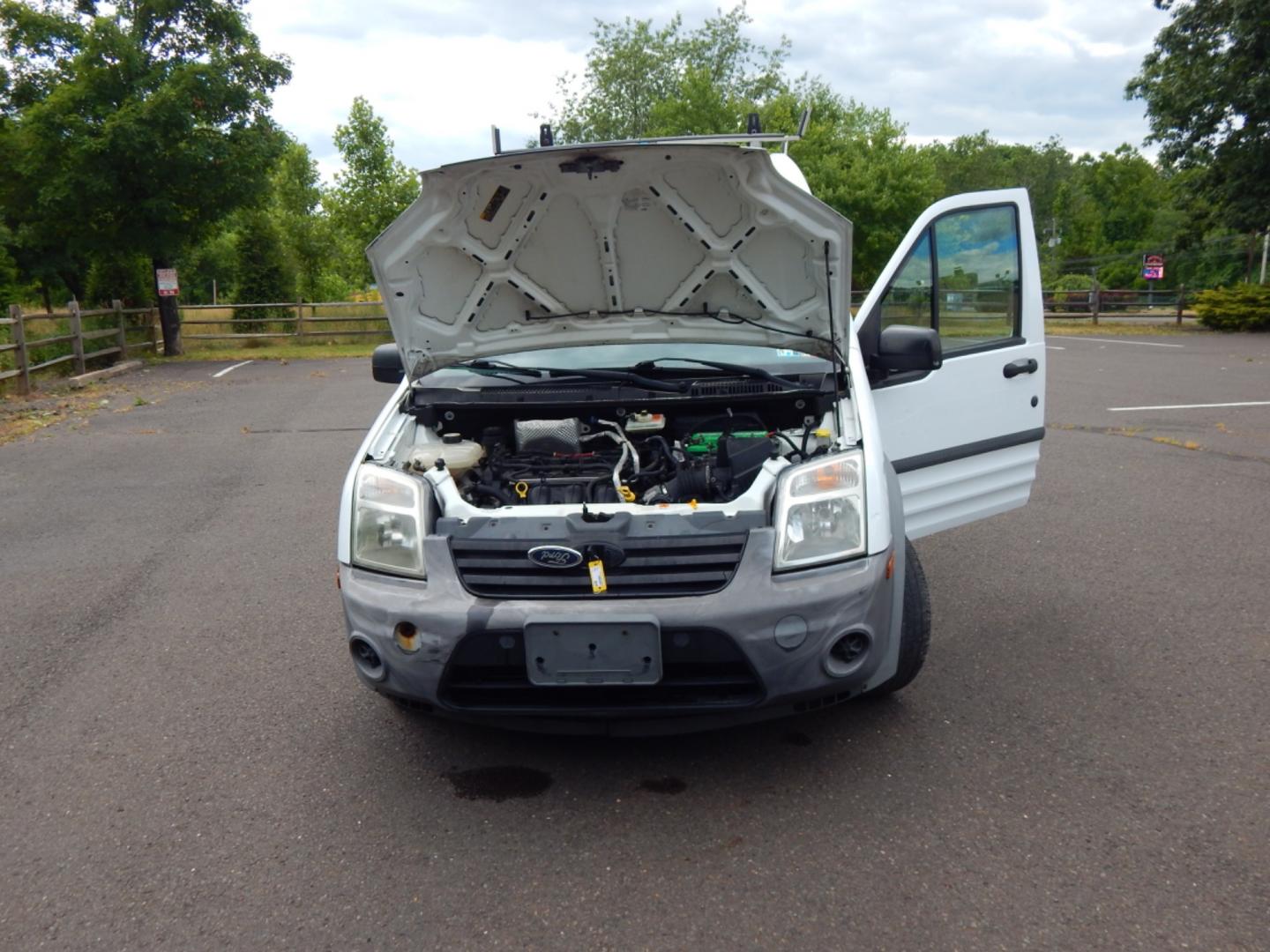 2012 White /Gray Cloth Ford Transit Connect XL (NM0LS7CN4CT) with an 2.0L 4 cylinder engine, Automatic transmission, located at 6528 Lower York Road, New Hope, PA, 18938, (215) 862-9555, 40.358707, -74.977882 - Here we have a Ford Transit Connect with a 2.0L 4 cylinder engine putting power to the front wheels via an automatic transmission. Options include: gray cloth, cargo shelves, dividing wall, AC/heat, AM/FM radio, roll up windows, 2 sliding doors, 50/50 split rear opening doors, tilt steering wheel, r - Photo#26