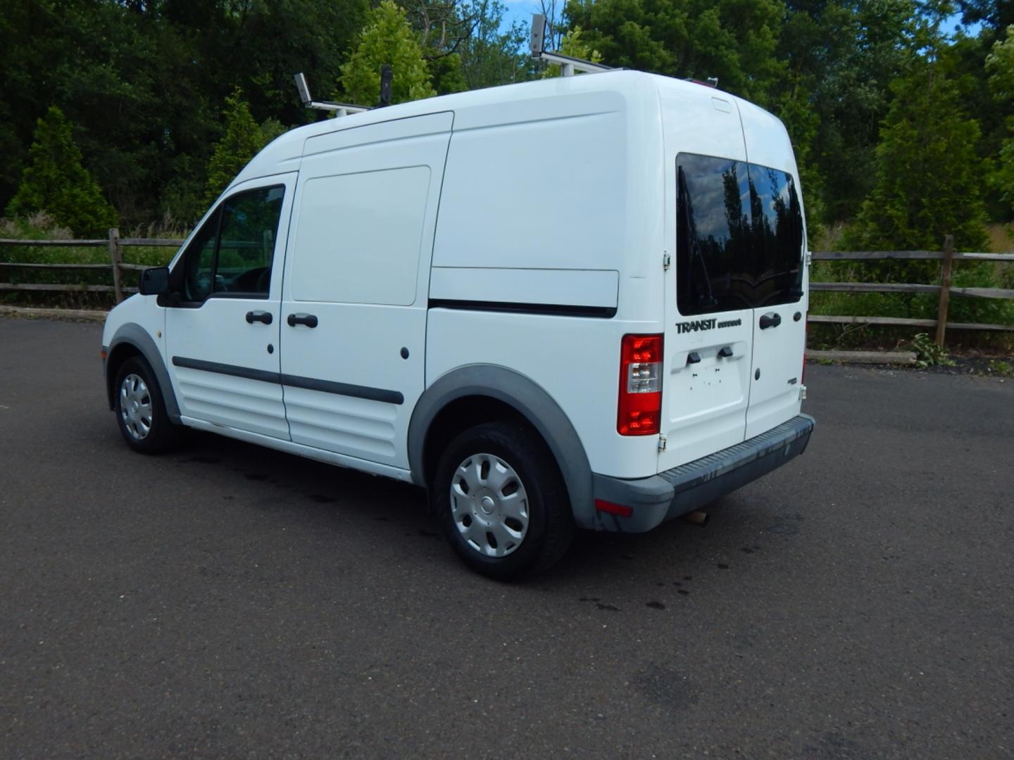 2012 White /Gray Cloth Ford Transit Connect XL (NM0LS7CN4CT) with an 2.0L 4 cylinder engine, Automatic transmission, located at 6528 Lower York Road, New Hope, PA, 18938, (215) 862-9555, 40.358707, -74.977882 - Here we have a Ford Transit Connect with a 2.0L 4 cylinder engine putting power to the front wheels via an automatic transmission. Options include: gray cloth, cargo shelves, dividing wall, AC/heat, AM/FM radio, roll up windows, 2 sliding doors, 50/50 split rear opening doors, tilt steering wheel, r - Photo#3