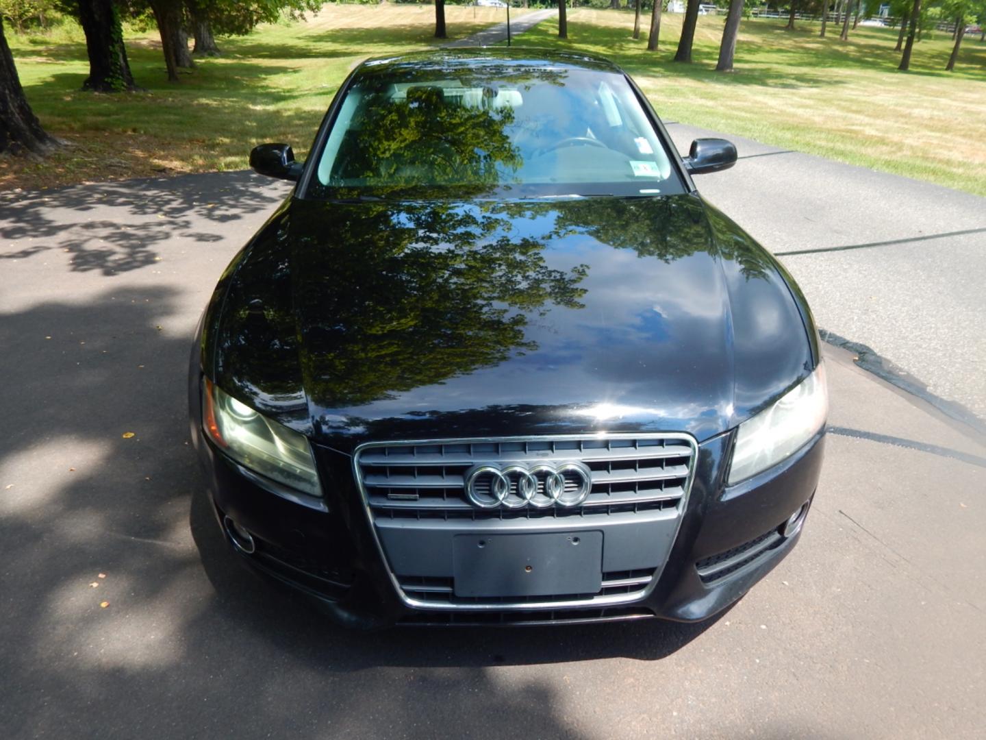 2011 Black /Black Leather Audi A5 Premium Plus (WAULFAFR8BA) with an 2.0L Turbo engine, Automatic transmission, located at 6528 Lower York Road, New Hope, PA, 18938, (215) 862-9555, 40.358707, -74.977882 - Here we have a 2011 Audi A5 Coupe premium plus package with a 2.0L 4 cylinder turbo engine putting power to all four wheels via a smooth shifting automatic transmission. Options include: black leather, dual power seats, dual heated seats, dual climate control, navigation, AM/FM/CD/SIRIUS/MEDIA radio - Photo#7