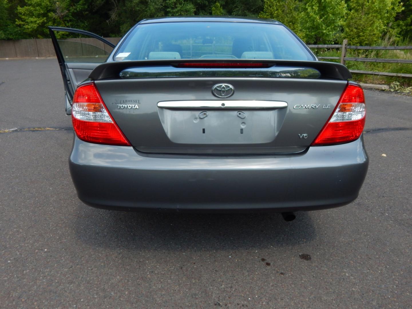 2003 Gray /Gray Cloth Toyota Camry LE V6 (4T1BF30K23U) with an 3.0L V6 DOHC 24V engine, 5-Speed Automatic Overdrive transmission, located at 6528 Lower York Road, New Hope, PA, 18938, (215) 862-9555, 40.358707, -74.977882 - Here we have a 2003 Toyota Camry LE with a 3.0L V6 putting power to the front wheels via a smooth shifting automatic transmission. Options include: gray cloth, heat/AC, power moving drivers seat, AM/FM/CD/TAPE radio, moonroof (inoperable), tilt steering wheel, cruise control, power windows/locks/mir - Photo#7