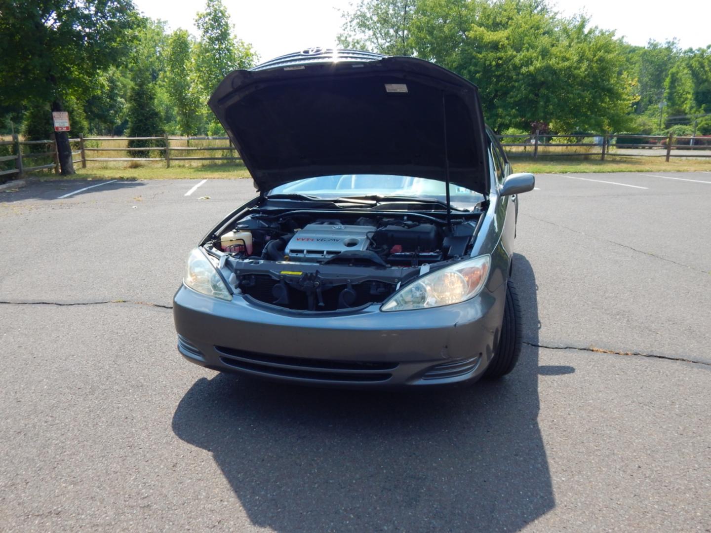 2003 Gray /Gray Cloth Toyota Camry LE V6 (4T1BF30K23U) with an 3.0L V6 DOHC 24V engine, 5-Speed Automatic Overdrive transmission, located at 6528 Lower York Road, New Hope, PA, 18938, (215) 862-9555, 40.358707, -74.977882 - Here we have a 2003 Toyota Camry LE with a 3.0L V6 putting power to the front wheels via a smooth shifting automatic transmission. Options include: gray cloth, heat/AC, power moving drivers seat, AM/FM/CD/TAPE radio, moonroof (inoperable), tilt steering wheel, cruise control, power windows/locks/mir - Photo#24