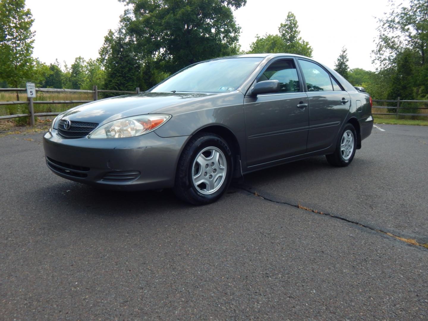 2003 Gray /Gray Cloth Toyota Camry LE V6 (4T1BF30K23U) with an 3.0L V6 DOHC 24V engine, 5-Speed Automatic Overdrive transmission, located at 6528 Lower York Road, New Hope, PA, 18938, (215) 862-9555, 40.358707, -74.977882 - Here we have a 2003 Toyota Camry LE with a 3.0L V6 putting power to the front wheels via a smooth shifting automatic transmission. Options include: gray cloth, heat/AC, power moving drivers seat, AM/FM/CD/TAPE radio, moonroof (inoperable), tilt steering wheel, cruise control, power windows/locks/mir - Photo#0