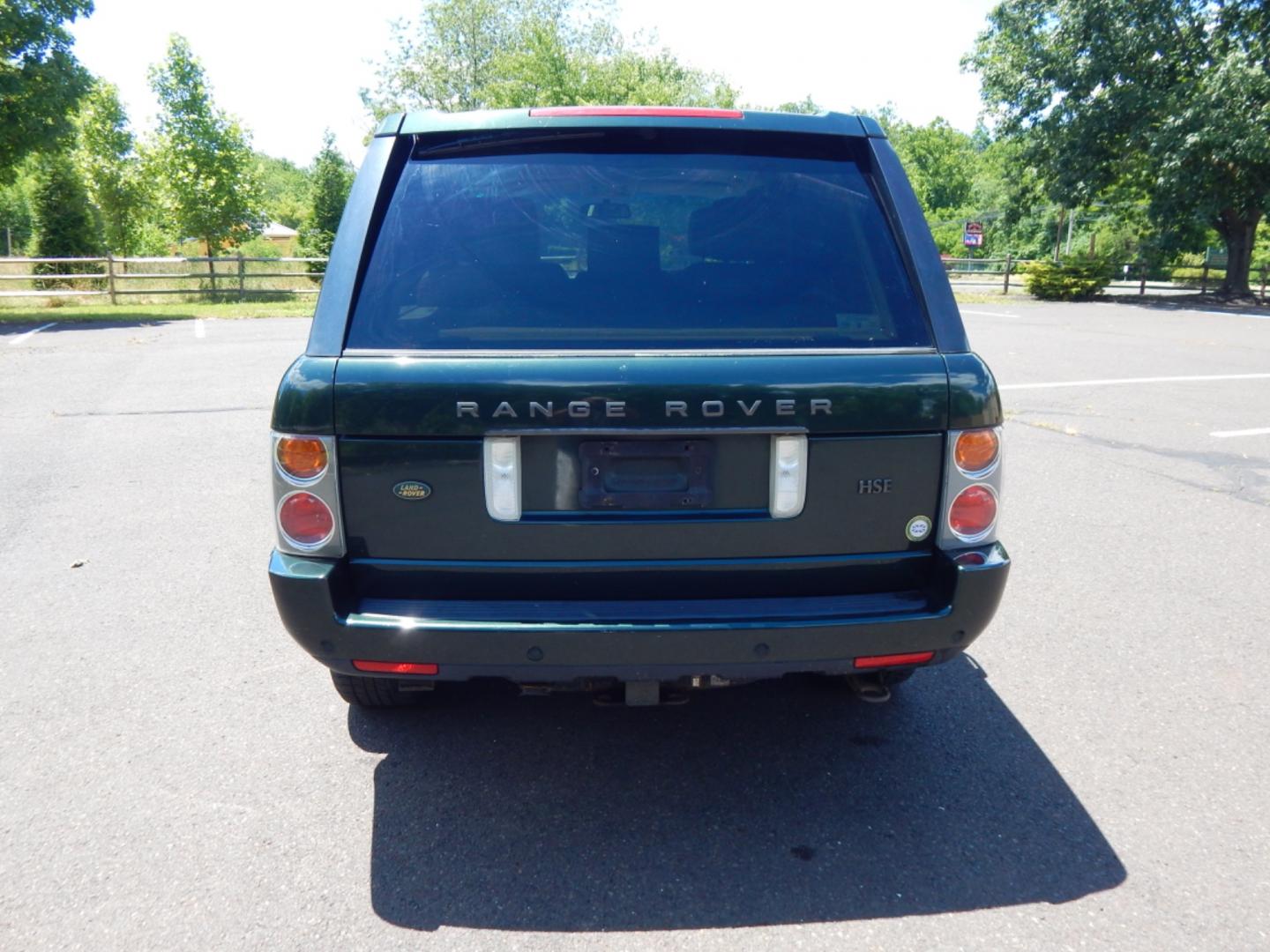 2003 Green /Tan Leather Land Rover Range Rover HSE (SALME11433A) with an 4.4L V8 DOHC 32V engine, 5-Speed Automatic Overdrive transmission, located at 6528 Lower York Road, New Hope, PA, 18938, (215) 862-9555, 40.358707, -74.977882 - Here we have a Range Rover HSE with a 4.4L V8 putting power to all four wheels via a smooth shifting automatic transmission. Options include: tan leather, dual climate controls, heated seats all around, moonroof, power front seats, AM/FM/DISC/TAPE radio, Harman/Kardon speakers, heated steering wheel - Photo#7