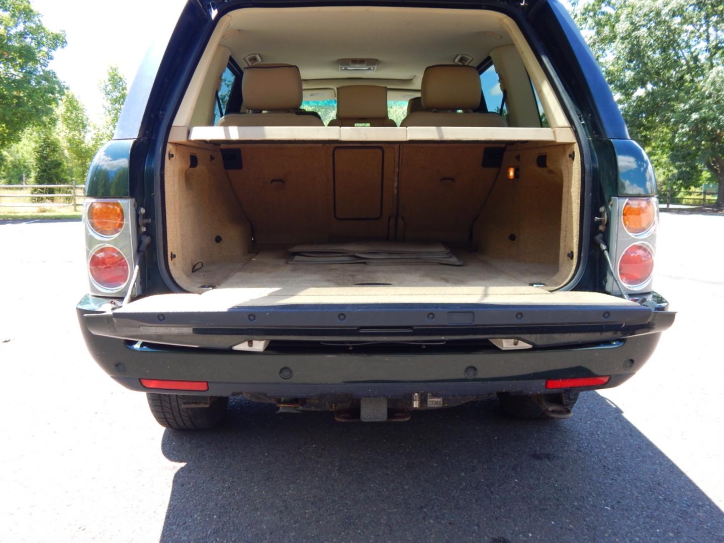 2003 Green /Tan Leather Land Rover Range Rover HSE (SALME11433A) with an 4.4L V8 DOHC 32V engine, 5-Speed Automatic Overdrive transmission, located at 6528 Lower York Road, New Hope, PA, 18938, (215) 862-9555, 40.358707, -74.977882 - Here we have a Range Rover HSE with a 4.4L V8 putting power to all four wheels via a smooth shifting automatic transmission. Options include: tan leather, dual climate controls, heated seats all around, moonroof, power front seats, AM/FM/DISC/TAPE radio, Harman/Kardon speakers, heated steering wheel - Photo#9