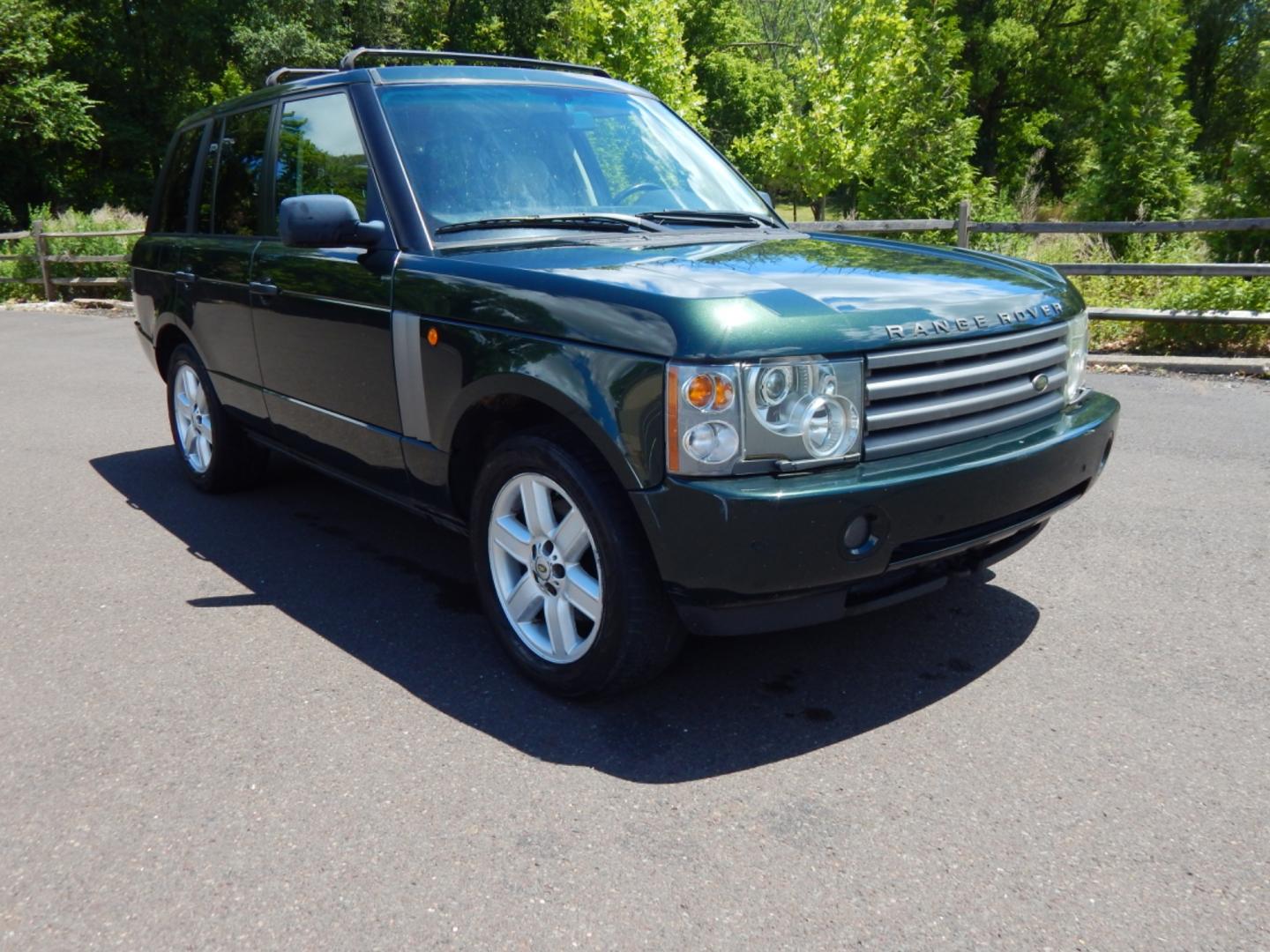 2003 Green /Tan Leather Land Rover Range Rover HSE (SALME11433A) with an 4.4L V8 DOHC 32V engine, 5-Speed Automatic Overdrive transmission, located at 6528 Lower York Road, New Hope, PA, 18938, (215) 862-9555, 40.358707, -74.977882 - Here we have a Range Rover HSE with a 4.4L V8 putting power to all four wheels via a smooth shifting automatic transmission. Options include: tan leather, dual climate controls, heated seats all around, moonroof, power front seats, AM/FM/DISC/TAPE radio, Harman/Kardon speakers, heated steering wheel - Photo#3