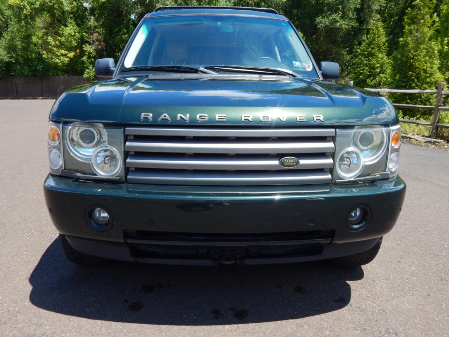 2003 Green /Tan Leather Land Rover Range Rover HSE (SALME11433A) with an 4.4L V8 DOHC 32V engine, 5-Speed Automatic Overdrive transmission, located at 6528 Lower York Road, New Hope, PA, 18938, (215) 862-9555, 40.358707, -74.977882 - Here we have a Range Rover HSE with a 4.4L V8 putting power to all four wheels via a smooth shifting automatic transmission. Options include: tan leather, dual climate controls, heated seats all around, moonroof, power front seats, AM/FM/DISC/TAPE radio, Harman/Kardon speakers, heated steering wheel - Photo#6