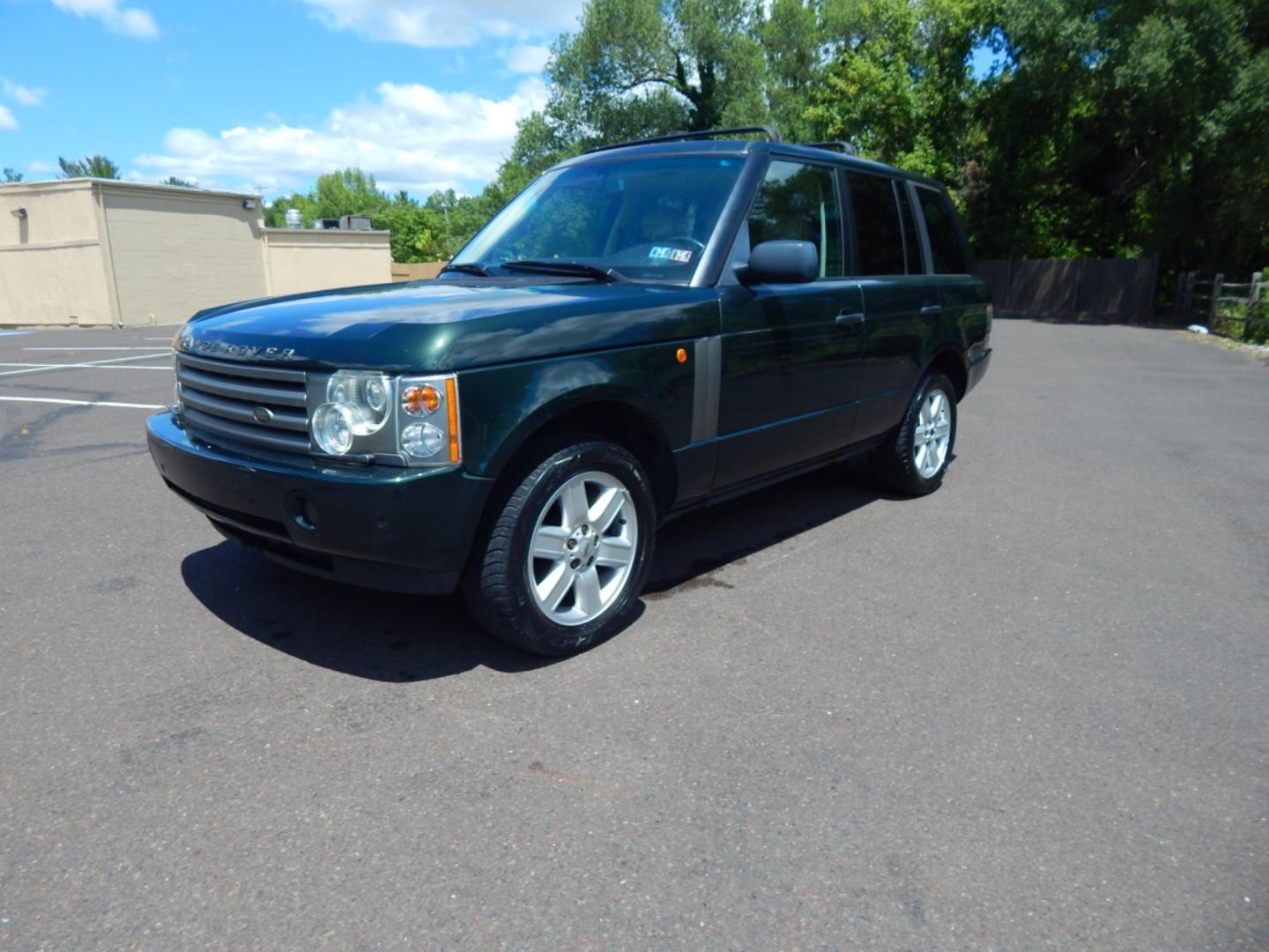 2003 Green /Tan Leather Land Rover Range Rover HSE (SALME11433A) with an 4.4L V8 DOHC 32V engine, 5-Speed Automatic Overdrive transmission, located at 6528 Lower York Road, New Hope, PA, 18938, (215) 862-9555, 40.358707, -74.977882 - Here we have a Range Rover HSE with a 4.4L V8 putting power to all four wheels via a smooth shifting automatic transmission. Options include: tan leather, dual climate controls, heated seats all around, moonroof, power front seats, AM/FM/DISC/TAPE radio, Harman/Kardon speakers, heated steering wheel - Photo#0