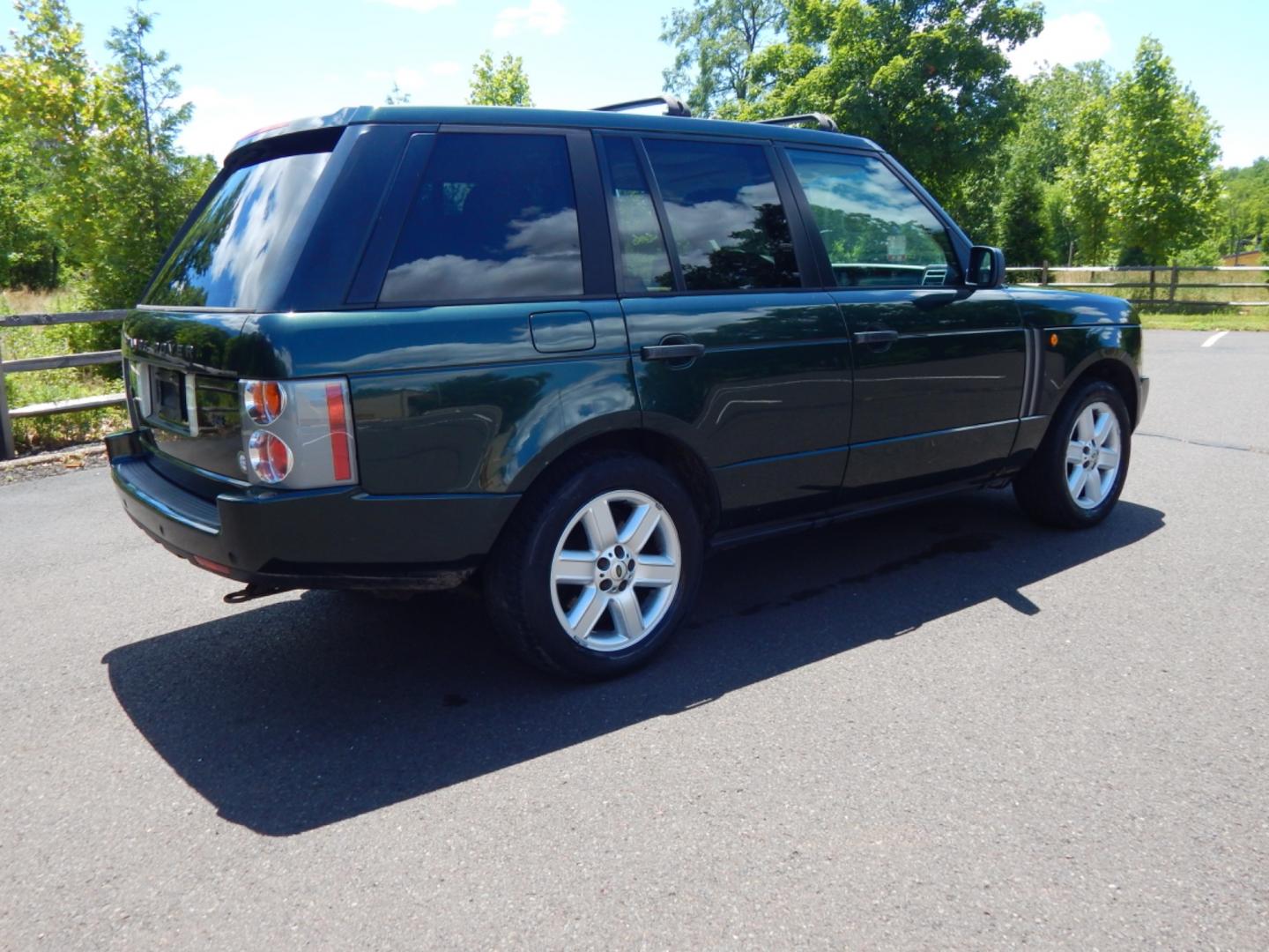 2003 Green /Tan Leather Land Rover Range Rover HSE (SALME11433A) with an 4.4L V8 DOHC 32V engine, 5-Speed Automatic Overdrive transmission, located at 6528 Lower York Road, New Hope, PA, 18938, (215) 862-9555, 40.358707, -74.977882 - Here we have a Range Rover HSE with a 4.4L V8 putting power to all four wheels via a smooth shifting automatic transmission. Options include: tan leather, dual climate controls, heated seats all around, moonroof, power front seats, AM/FM/DISC/TAPE radio, Harman/Kardon speakers, heated steering wheel - Photo#5