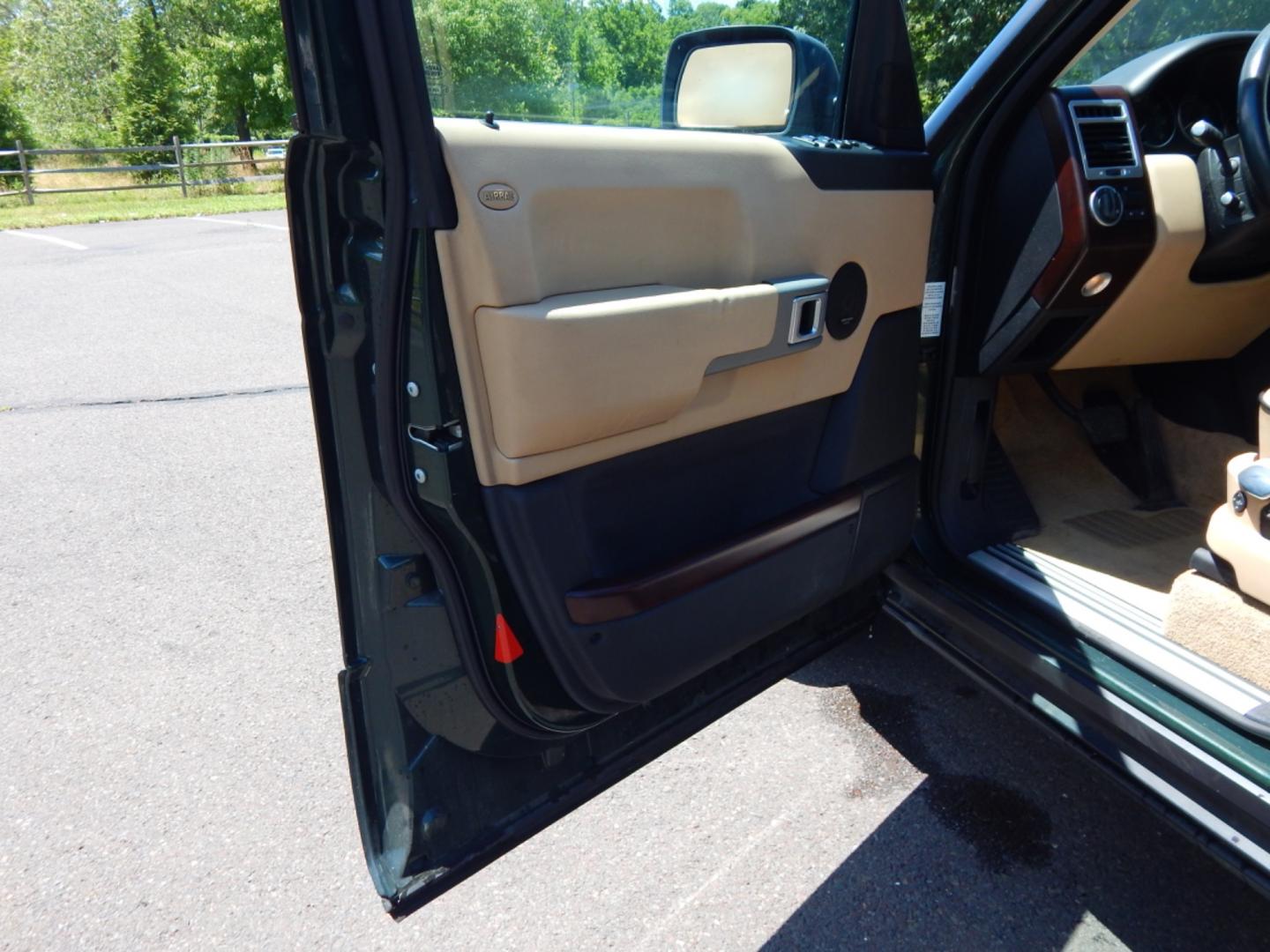 2003 Green /Tan Leather Land Rover Range Rover HSE (SALME11433A) with an 4.4L V8 DOHC 32V engine, 5-Speed Automatic Overdrive transmission, located at 6528 Lower York Road, New Hope, PA, 18938, (215) 862-9555, 40.358707, -74.977882 - Here we have a Range Rover HSE with a 4.4L V8 putting power to all four wheels via a smooth shifting automatic transmission. Options include: tan leather, dual climate controls, heated seats all around, moonroof, power front seats, AM/FM/DISC/TAPE radio, Harman/Kardon speakers, heated steering wheel - Photo#13