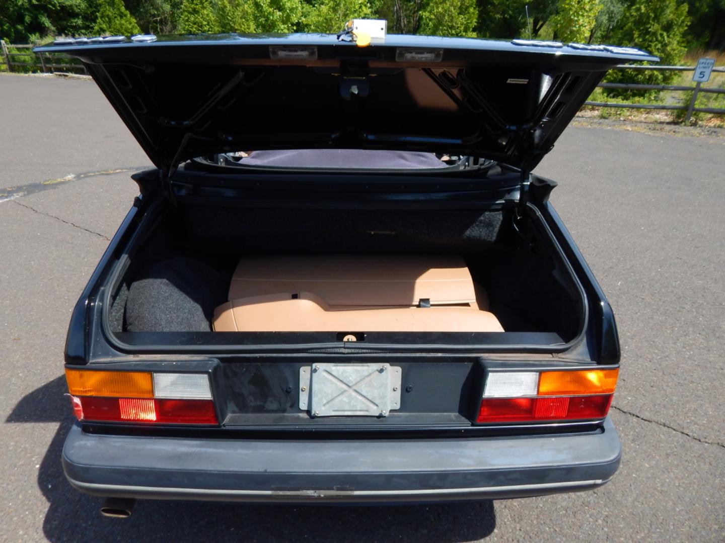 1989 Black /Tan Leather Saab 900 Turbo convertible (YS3AT76L0K7) with an 2.0L L4 DOHC 16V TURBO engine, 3-Speed Automatic transmission, located at 6528 Lower York Road, New Hope, PA, 18938, (215) 862-9555, 40.358707, -74.977882 - Here we have a Saab 900 Turbo with a 2.0L 4 cylinder Turbo engine putting power to the front wheels via an automatic transmission. Options include: tan leather, heat, mobile phone comes with car, heated drivers seat, power convertible top, power windows, power mirrors, 15 inch alloy wheels and seats - Photo#26