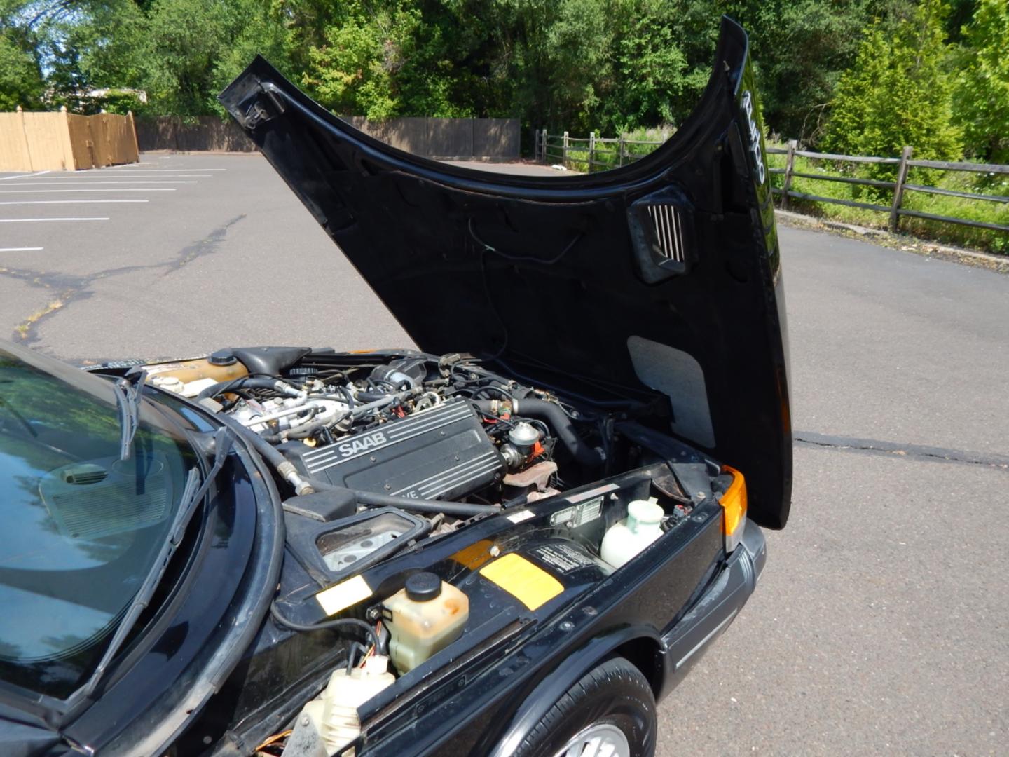 1989 Black /Tan Leather Saab 900 Turbo convertible (YS3AT76L0K7) with an 2.0L L4 DOHC 16V TURBO engine, 3-Speed Automatic transmission, located at 6528 Lower York Road, New Hope, PA, 18938, (215) 862-9555, 40.358707, -74.977882 - Here we have a Saab 900 Turbo with a 2.0L 4 cylinder Turbo engine putting power to the front wheels via an automatic transmission. Options include: tan leather, heat, mobile phone comes with car, heated drivers seat, power convertible top, power windows, power mirrors, 15 inch alloy wheels and seats - Photo#22