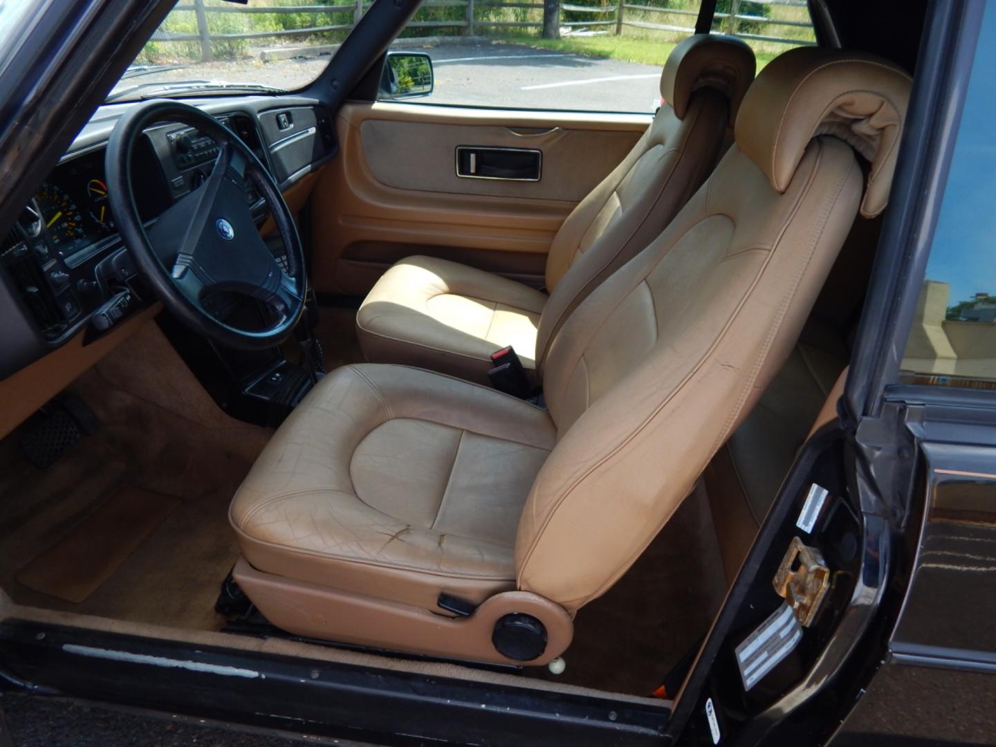 1989 Black /Tan Leather Saab 900 Turbo convertible (YS3AT76L0K7) with an 2.0L L4 DOHC 16V TURBO engine, 3-Speed Automatic transmission, located at 6528 Lower York Road, New Hope, PA, 18938, (215) 862-9555, 40.358707, -74.977882 - Here we have a Saab 900 Turbo with a 2.0L 4 cylinder Turbo engine putting power to the front wheels via an automatic transmission. Options include: tan leather, heat, mobile phone comes with car, heated drivers seat, power convertible top, power windows, power mirrors, 15 inch alloy wheels and seats - Photo#9