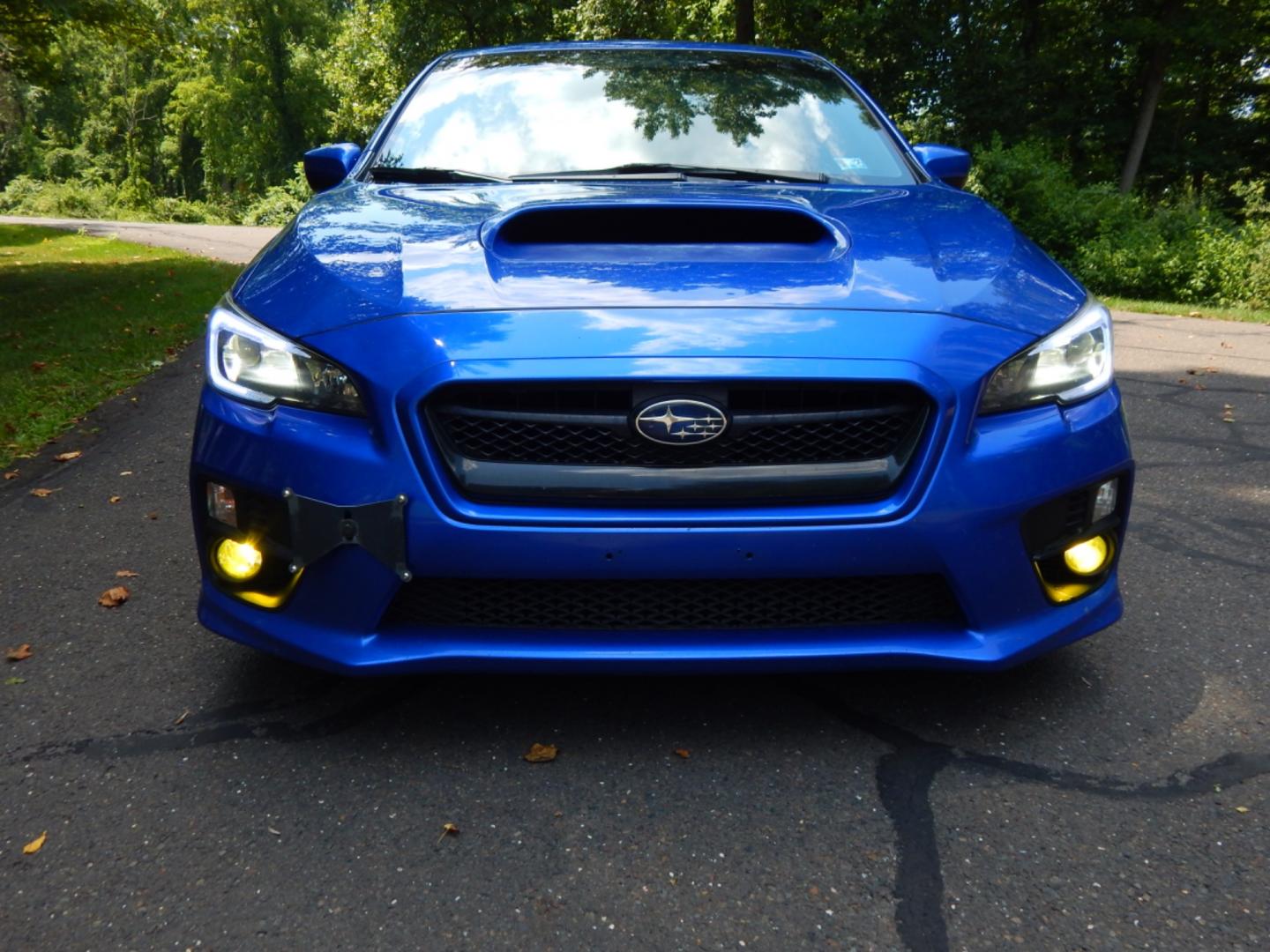 2016 Blue /Black Leather Subaru WRX Limited (JF1VA1J65G9) with an 2.0L H4 DOHC 16V engine, 6 Speed Manual transmission, located at 6528 Lower York Road, New Hope, PA, 18938, (215) 862-9555, 40.358707, -74.977882 - Here we have a very fun driving Subaru WRX Limited with a 2.0L Turbo 4 cylinder engine putting power to all four wheels via a smooth shifting 6 speed manual transmission. Options include: black leather, keyless entry, carbon trim, cruise control, tilt steering wheel, power windows/locks/mirrors, pow - Photo#5