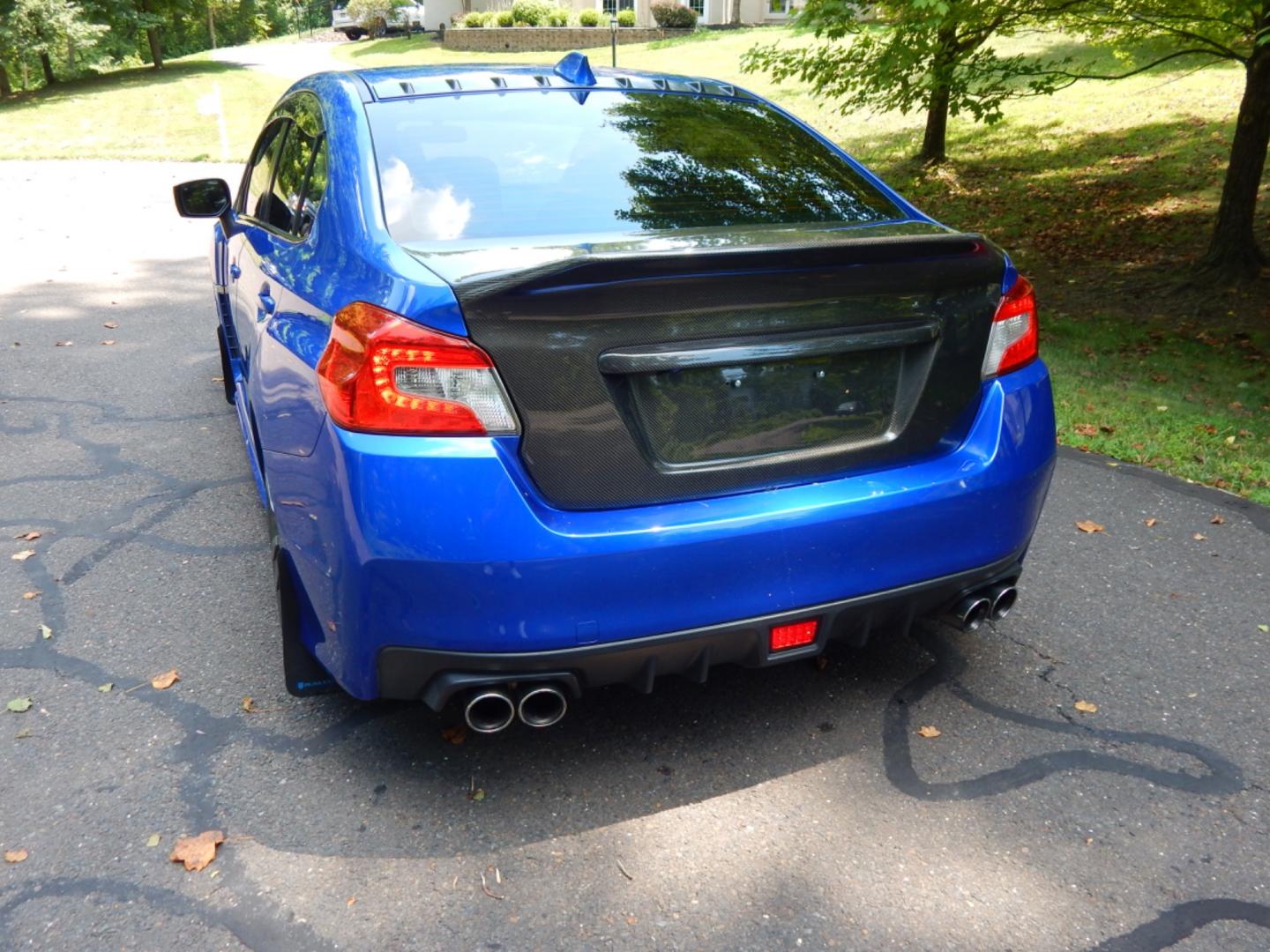 2016 Blue /Black Leather Subaru WRX Limited (JF1VA1J65G9) with an 2.0L H4 DOHC 16V engine, 6 Speed Manual transmission, located at 6528 Lower York Road, New Hope, PA, 18938, (215) 862-9555, 40.358707, -74.977882 - Here we have a very fun driving Subaru WRX Limited with a 2.0L Turbo 4 cylinder engine putting power to all four wheels via a smooth shifting 6 speed manual transmission. Options include: black leather, keyless entry, carbon trim, cruise control, tilt steering wheel, power windows/locks/mirrors, pow - Photo#6