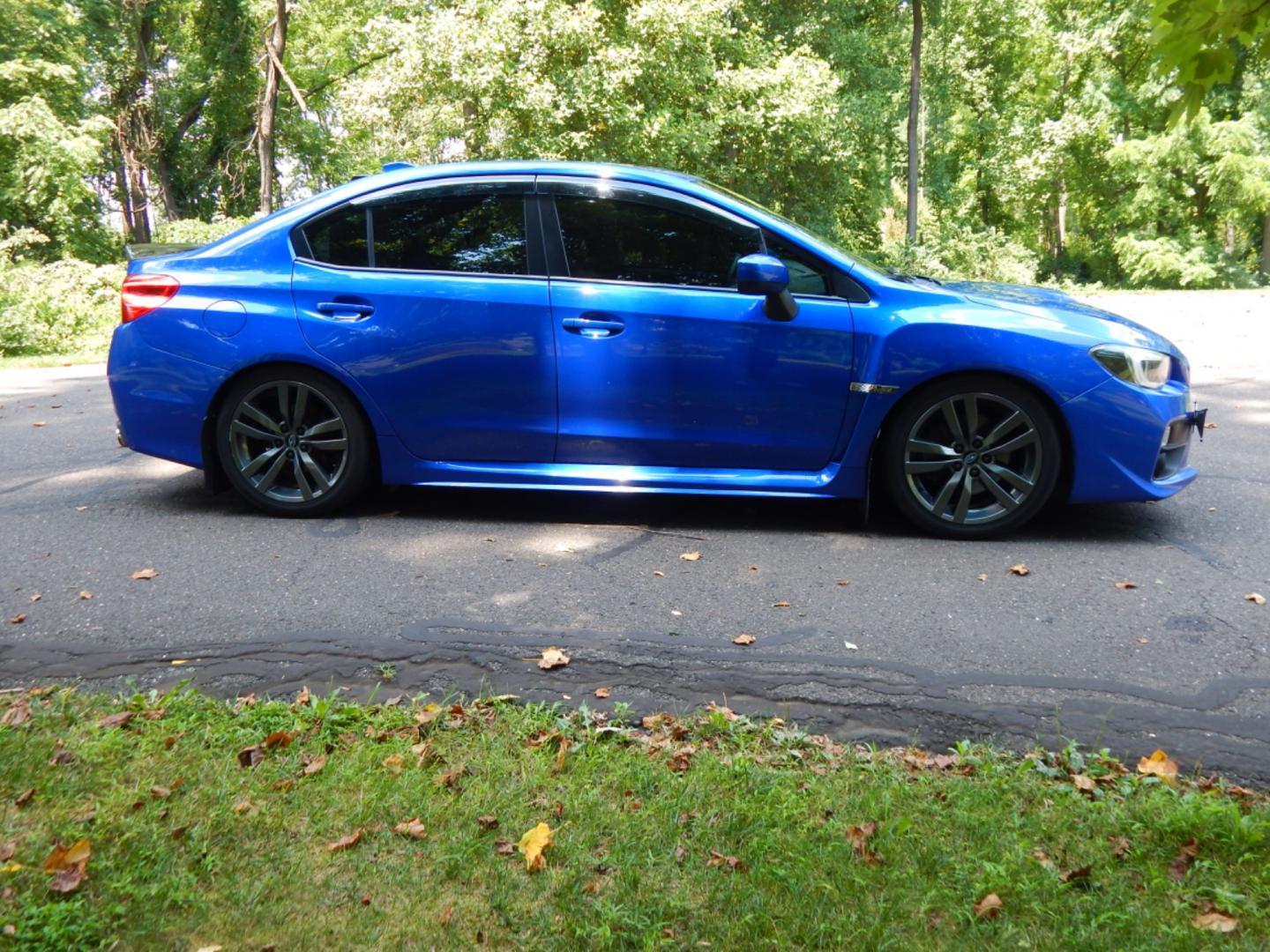 2016 Blue /Black Leather Subaru WRX Limited (JF1VA1J65G9) with an 2.0L H4 DOHC 16V engine, 6 Speed Manual transmission, located at 6528 Lower York Road, New Hope, PA, 18938, (215) 862-9555, 40.358707, -74.977882 - Here we have a very fun driving Subaru WRX Limited with a 2.0L Turbo 4 cylinder engine putting power to all four wheels via a smooth shifting 6 speed manual transmission. Options include: black leather, keyless entry, carbon trim, cruise control, tilt steering wheel, power windows/locks/mirrors, pow - Photo#3