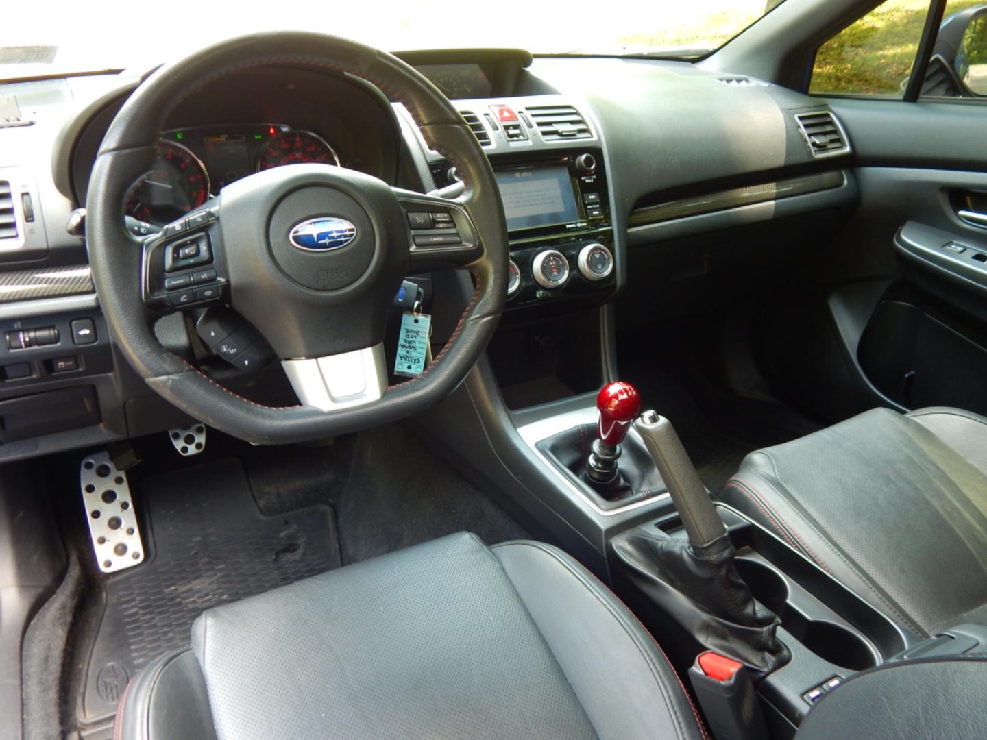 2016 Blue /Black Leather Subaru WRX Limited (JF1VA1J65G9) with an 2.0L H4 DOHC 16V engine, 6 Speed Manual transmission, located at 6528 Lower York Road, New Hope, PA, 18938, (215) 862-9555, 40.358707, -74.977882 - Here we have a very fun driving Subaru WRX Limited with a 2.0L Turbo 4 cylinder engine putting power to all four wheels via a smooth shifting 6 speed manual transmission. Options include: black leather, keyless entry, carbon trim, cruise control, tilt steering wheel, power windows/locks/mirrors, pow - Photo#11