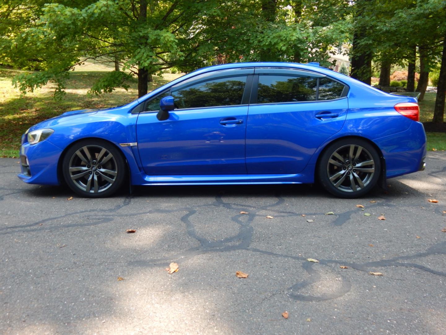 2016 Blue /Black Leather Subaru WRX Limited (JF1VA1J65G9) with an 2.0L H4 DOHC 16V engine, 6 Speed Manual transmission, located at 6528 Lower York Road, New Hope, PA, 18938, (215) 862-9555, 40.358707, -74.977882 - Here we have a very fun driving Subaru WRX Limited with a 2.0L Turbo 4 cylinder engine putting power to all four wheels via a smooth shifting 6 speed manual transmission. Options include: black leather, keyless entry, carbon trim, cruise control, tilt steering wheel, power windows/locks/mirrors, pow - Photo#1