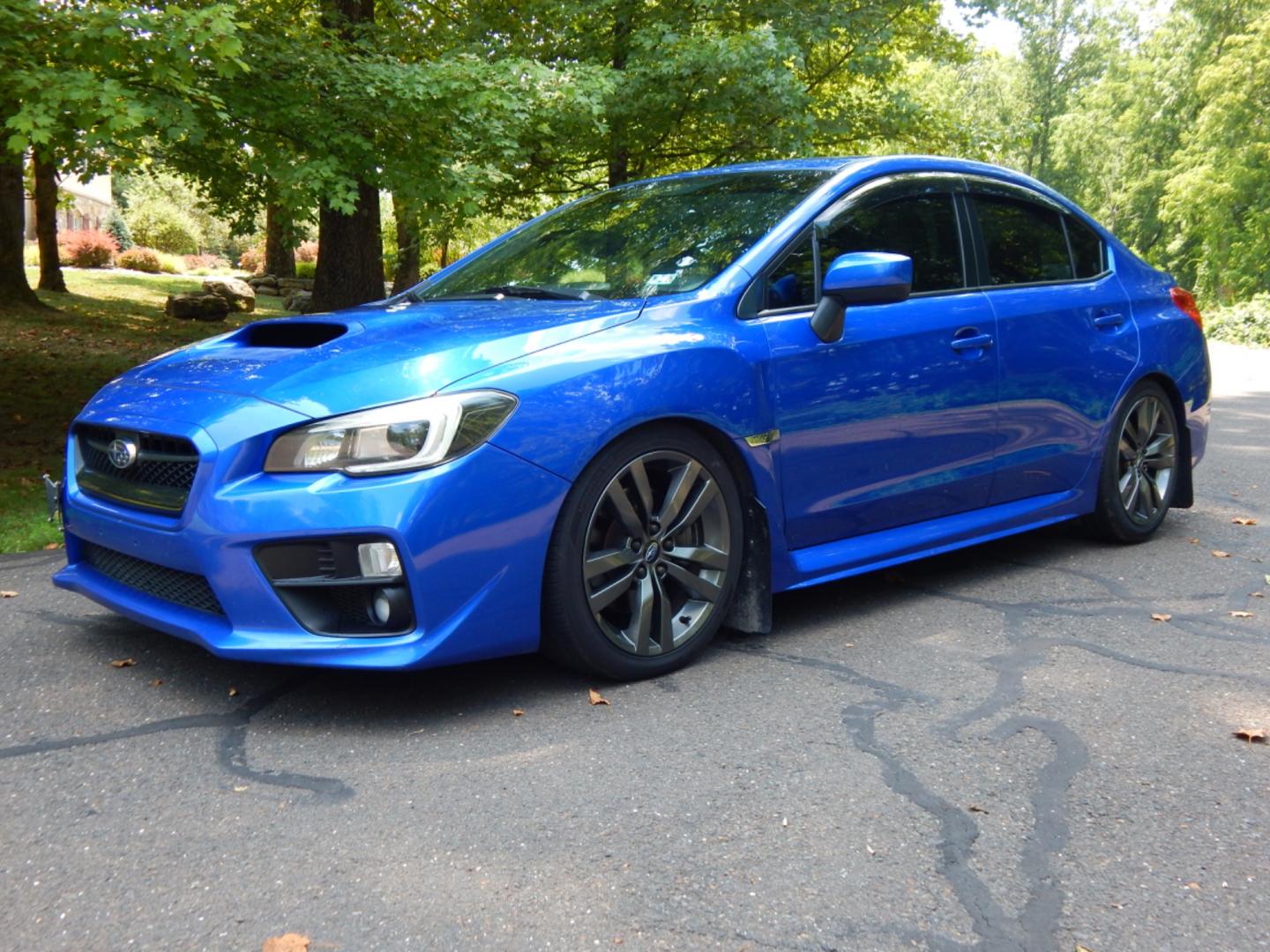 2016 Blue /Black Leather Subaru WRX Limited (JF1VA1J65G9) with an 2.0L H4 DOHC 16V engine, 6 Speed Manual transmission, located at 6528 Lower York Road, New Hope, PA, 18938, (215) 862-9555, 40.358707, -74.977882 - Here we have a very fun driving Subaru WRX Limited with a 2.0L Turbo 4 cylinder engine putting power to all four wheels via a smooth shifting 6 speed manual transmission. Options include: black leather, keyless entry, carbon trim, cruise control, tilt steering wheel, power windows/locks/mirrors, pow - Photo#0