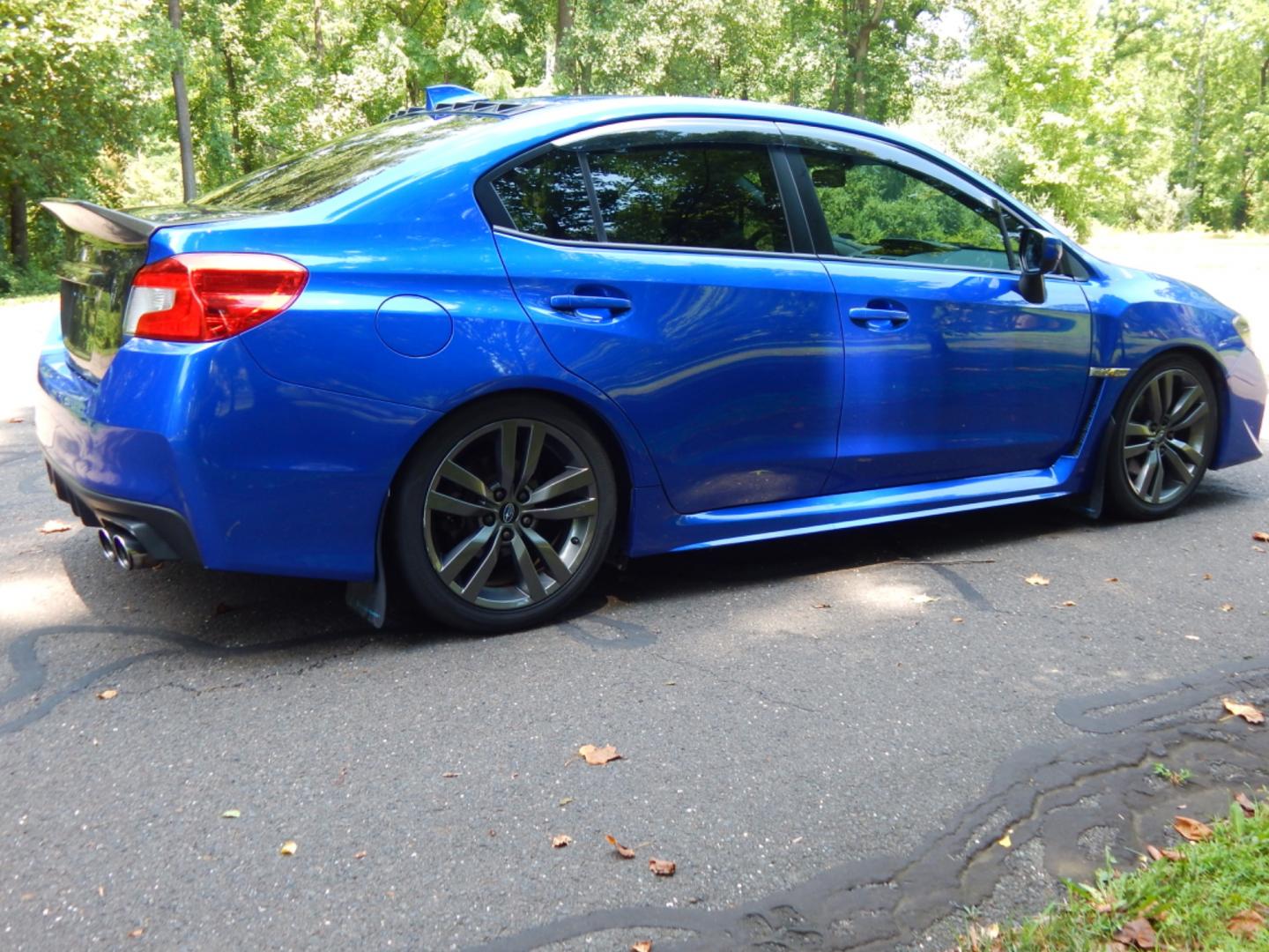 2016 Blue /Black Leather Subaru WRX Limited (JF1VA1J65G9) with an 2.0L H4 DOHC 16V engine, 6 Speed Manual transmission, located at 6528 Lower York Road, New Hope, PA, 18938, (215) 862-9555, 40.358707, -74.977882 - Here we have a very fun driving Subaru WRX Limited with a 2.0L Turbo 4 cylinder engine putting power to all four wheels via a smooth shifting 6 speed manual transmission. Options include: black leather, keyless entry, carbon trim, cruise control, tilt steering wheel, power windows/locks/mirrors, pow - Photo#4